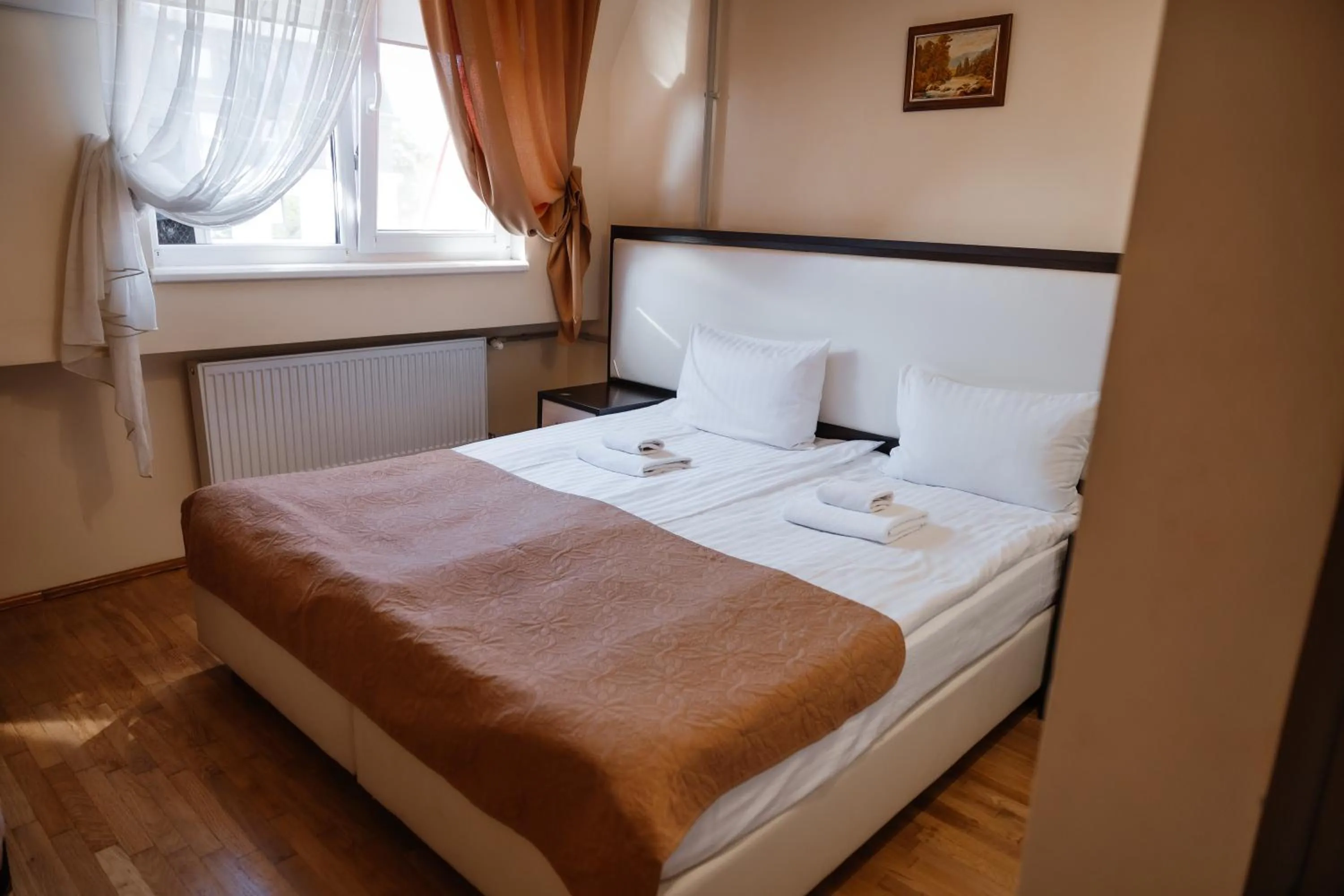 Bed in Pysanka Hotel
