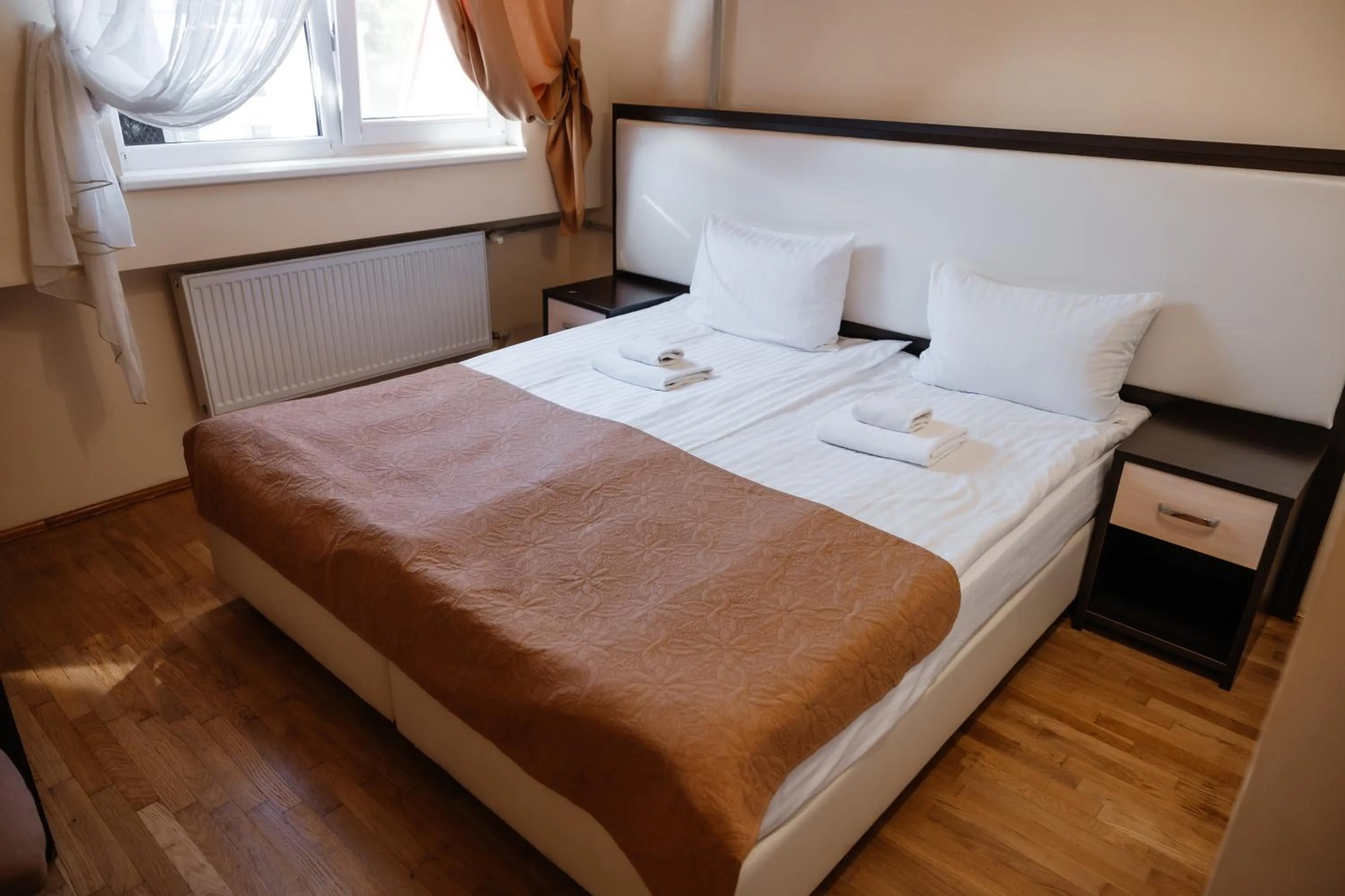 Bed in Pysanka Hotel