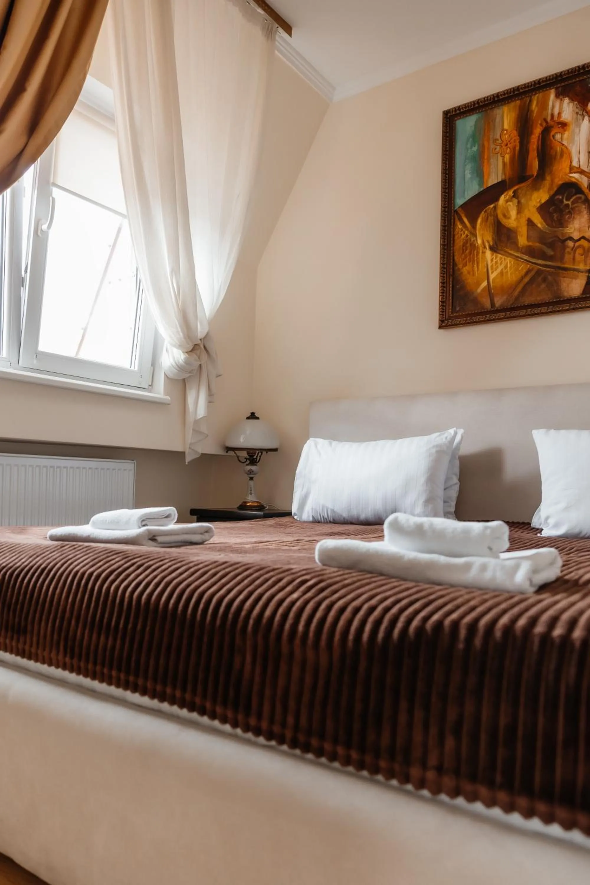 Bed in Pysanka Hotel