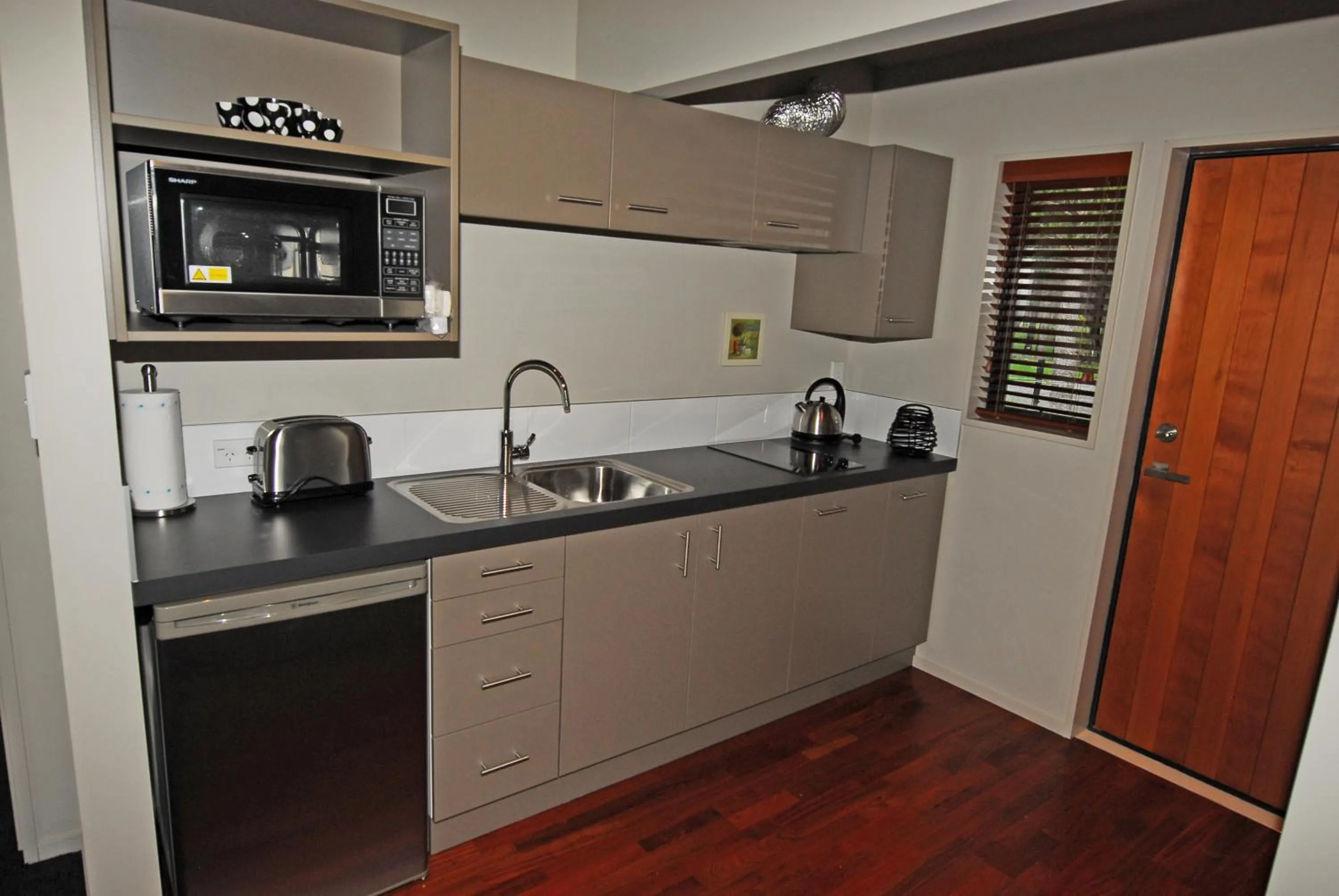 Kitchen or kitchenette in Woodbank Park Cottages