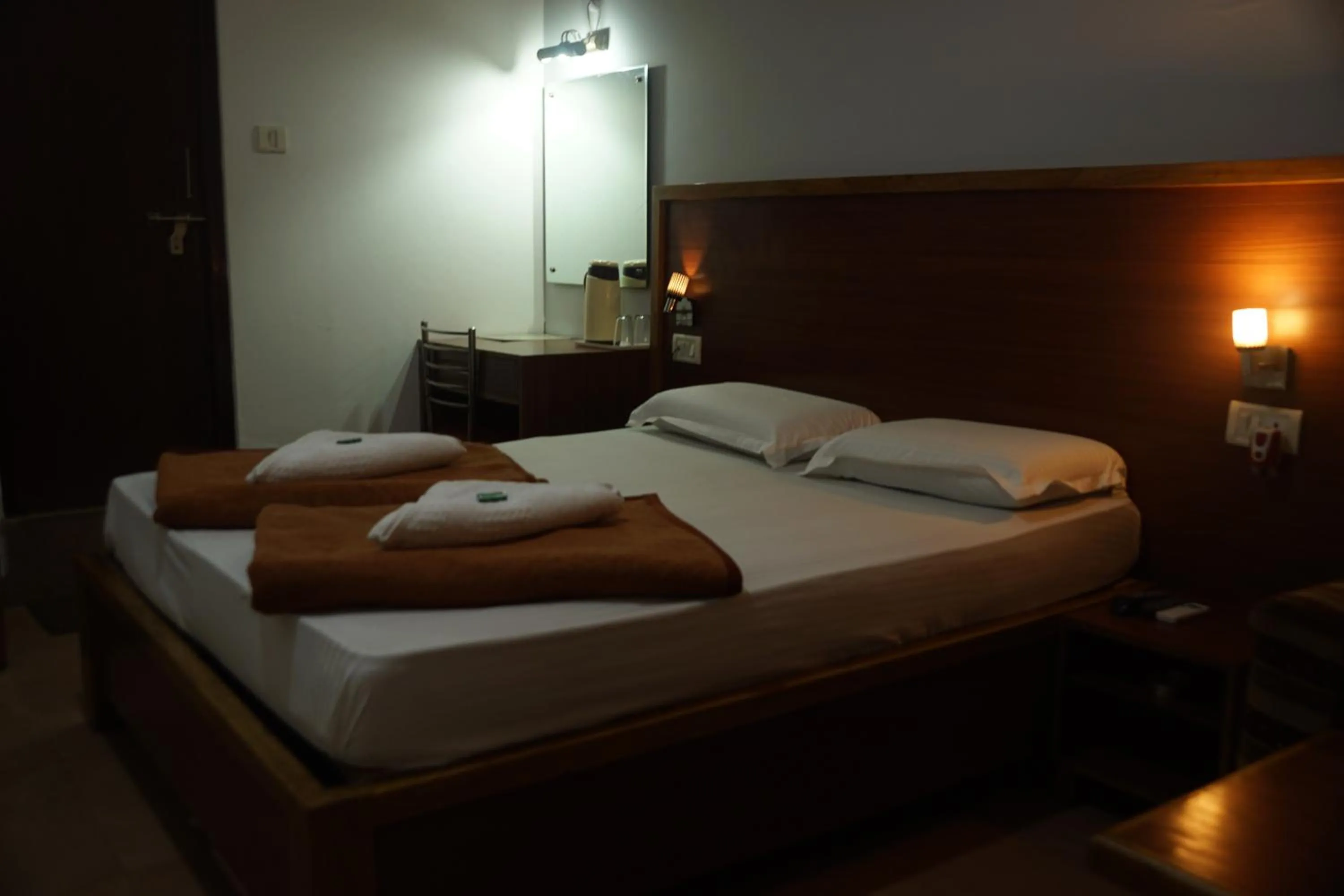 Bed in Subhash Hotel