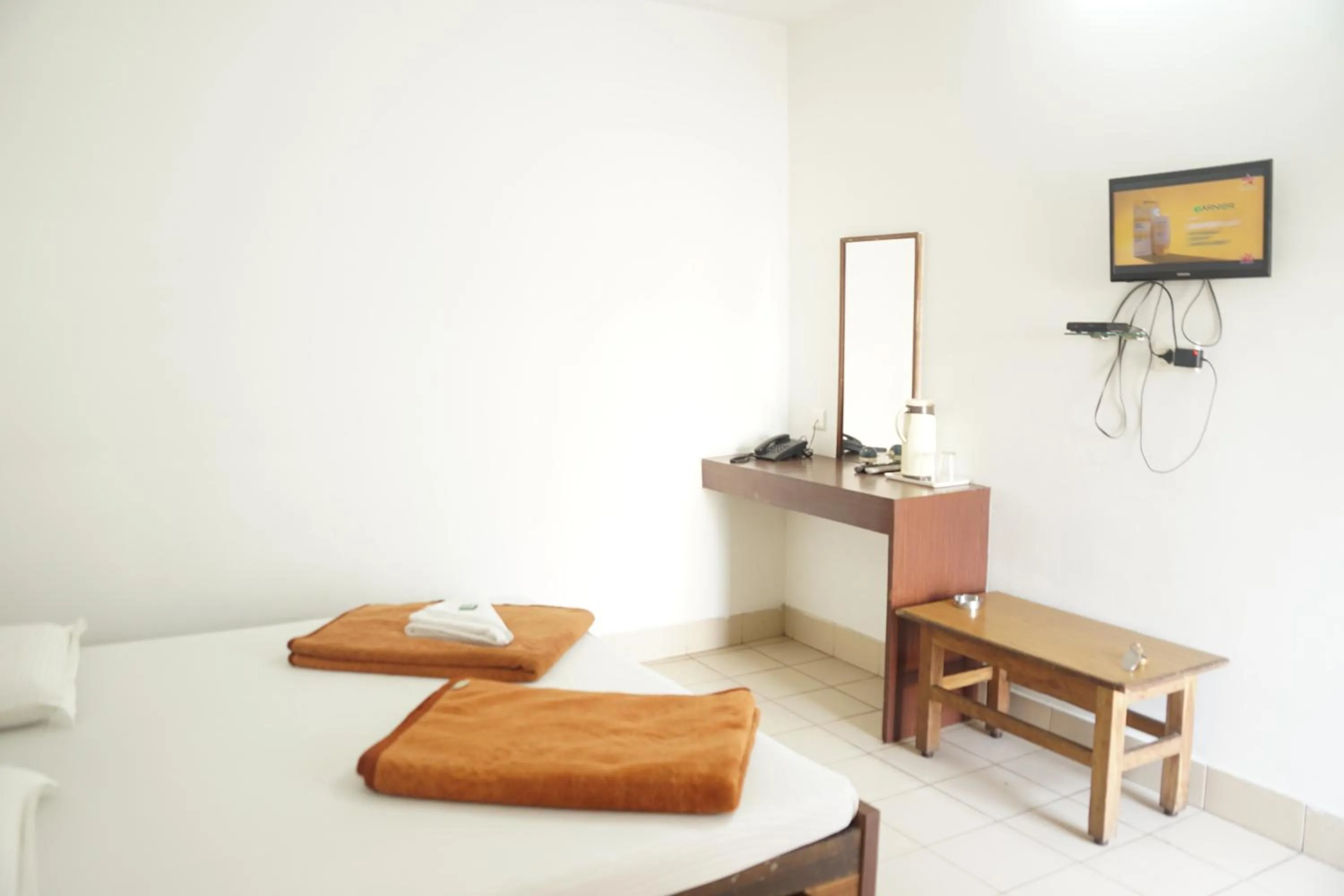 Bed in Subhash Hotel