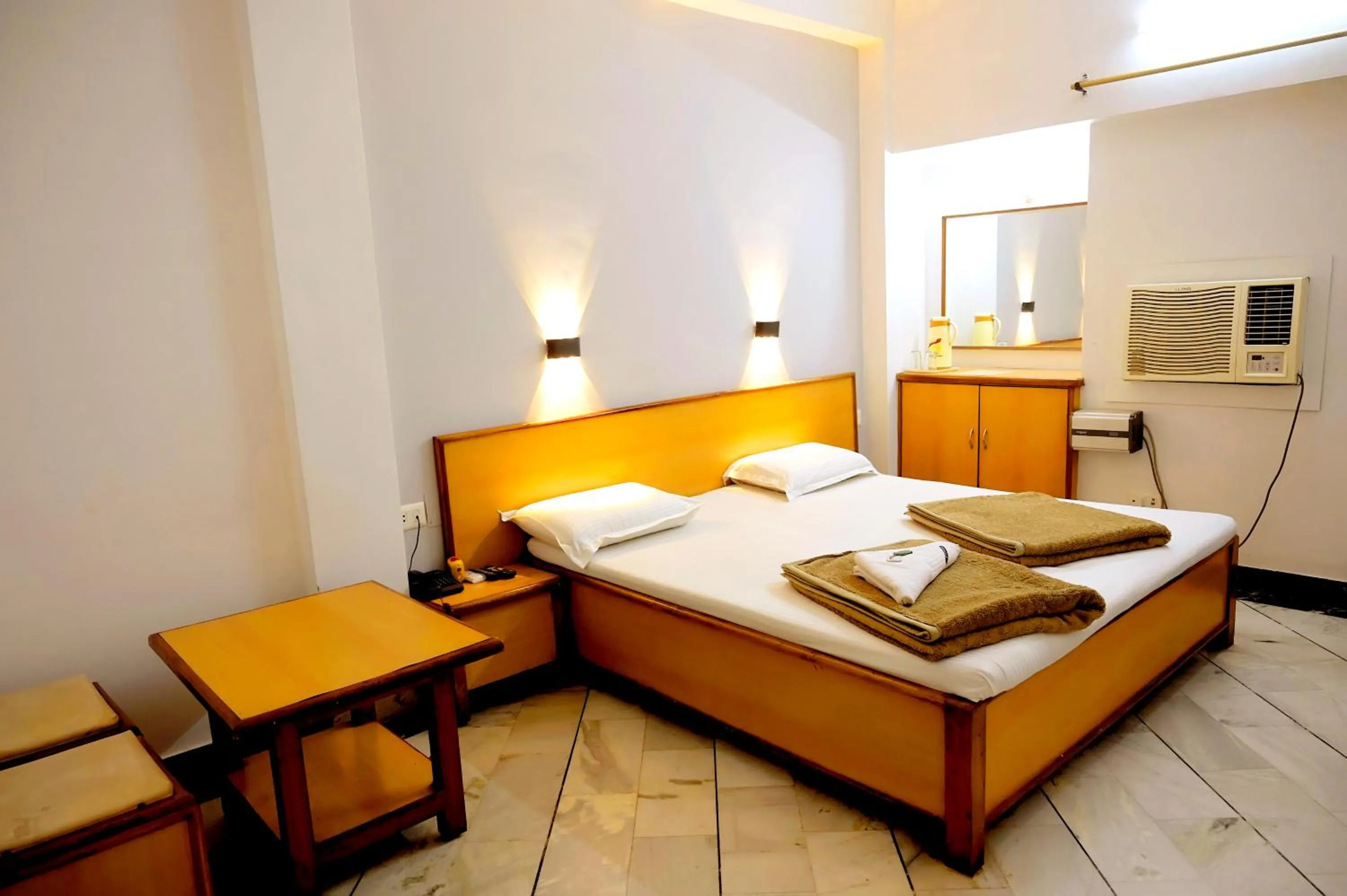 Bed in Subhash Hotel