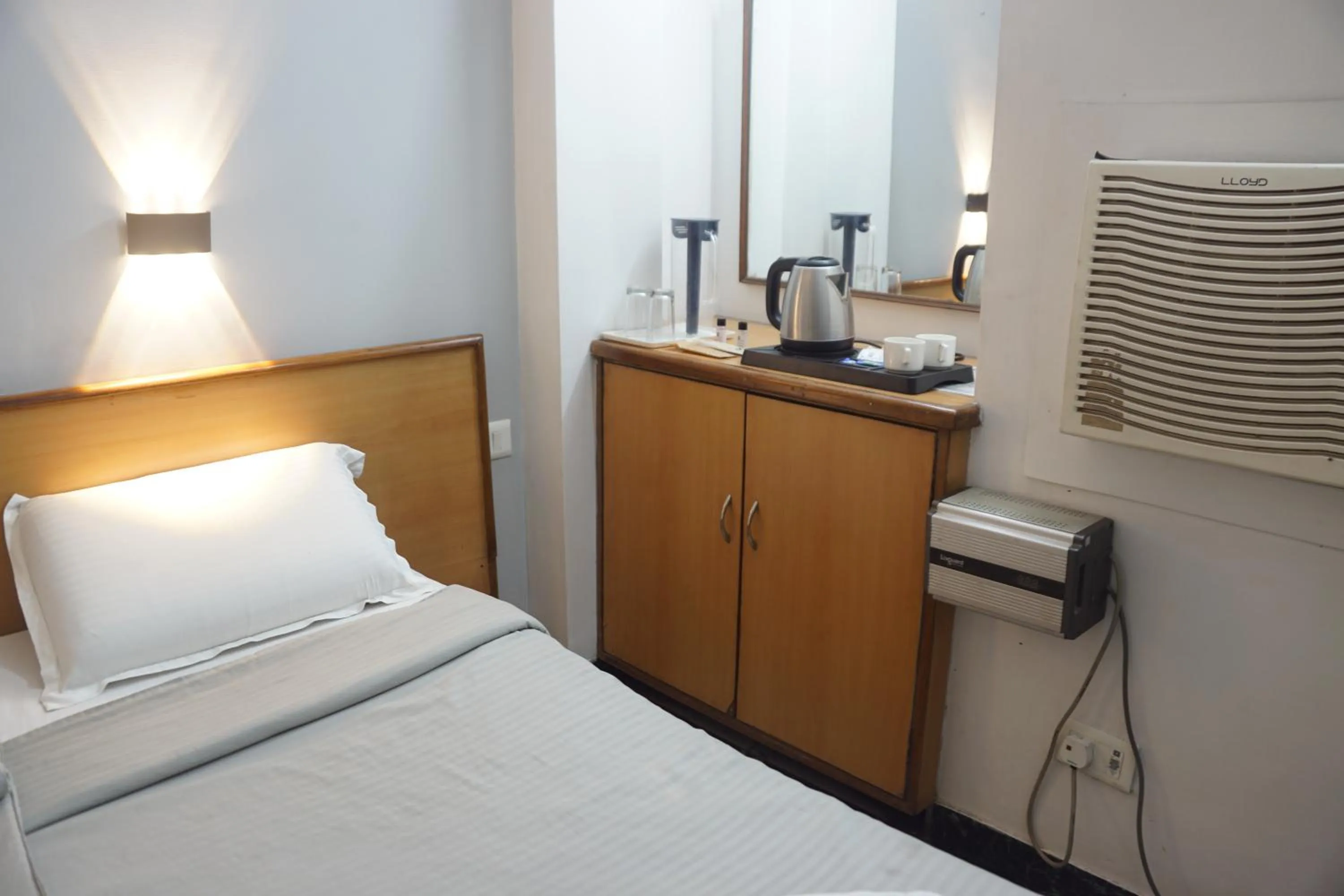 Bed in Subhash Hotel