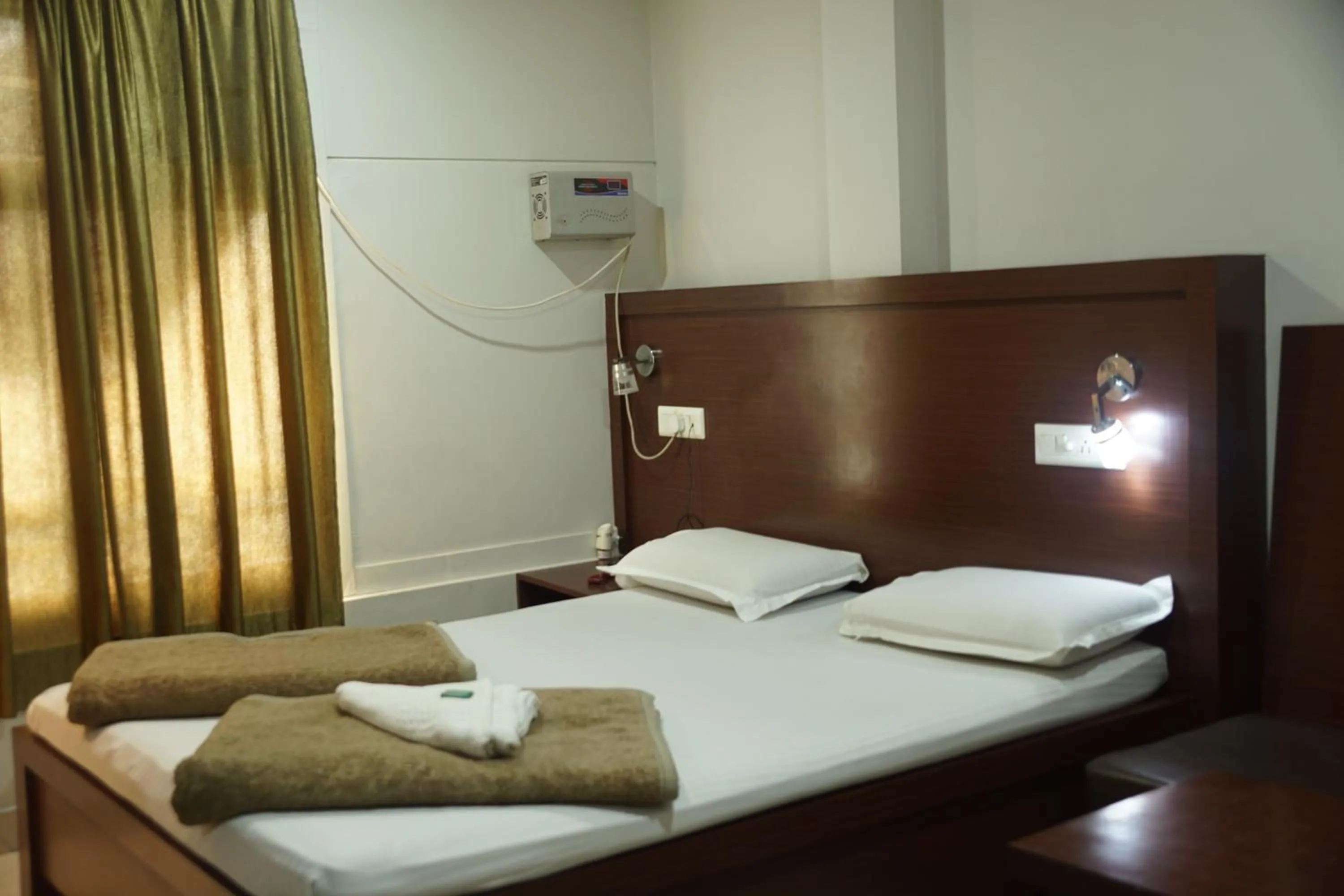 Bed in Subhash Hotel