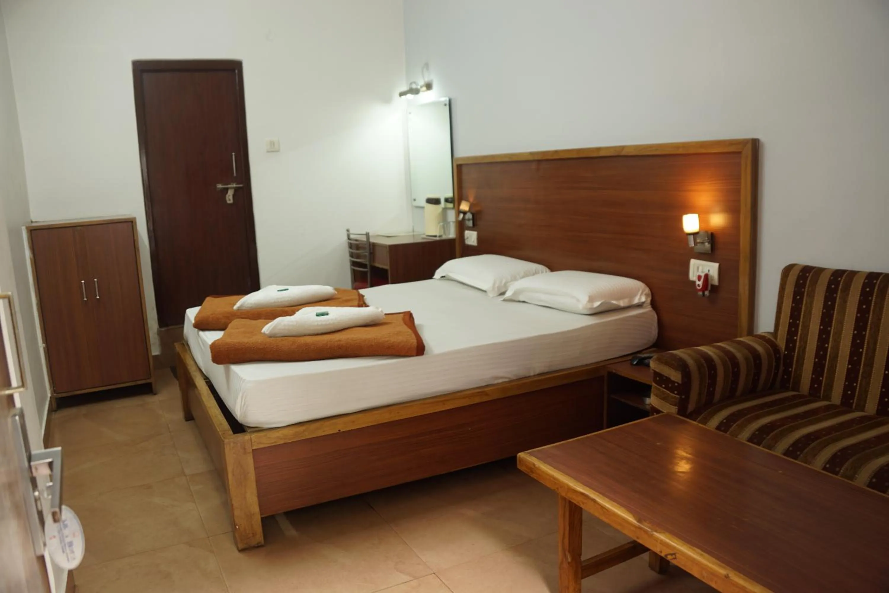 Bed in Subhash Hotel