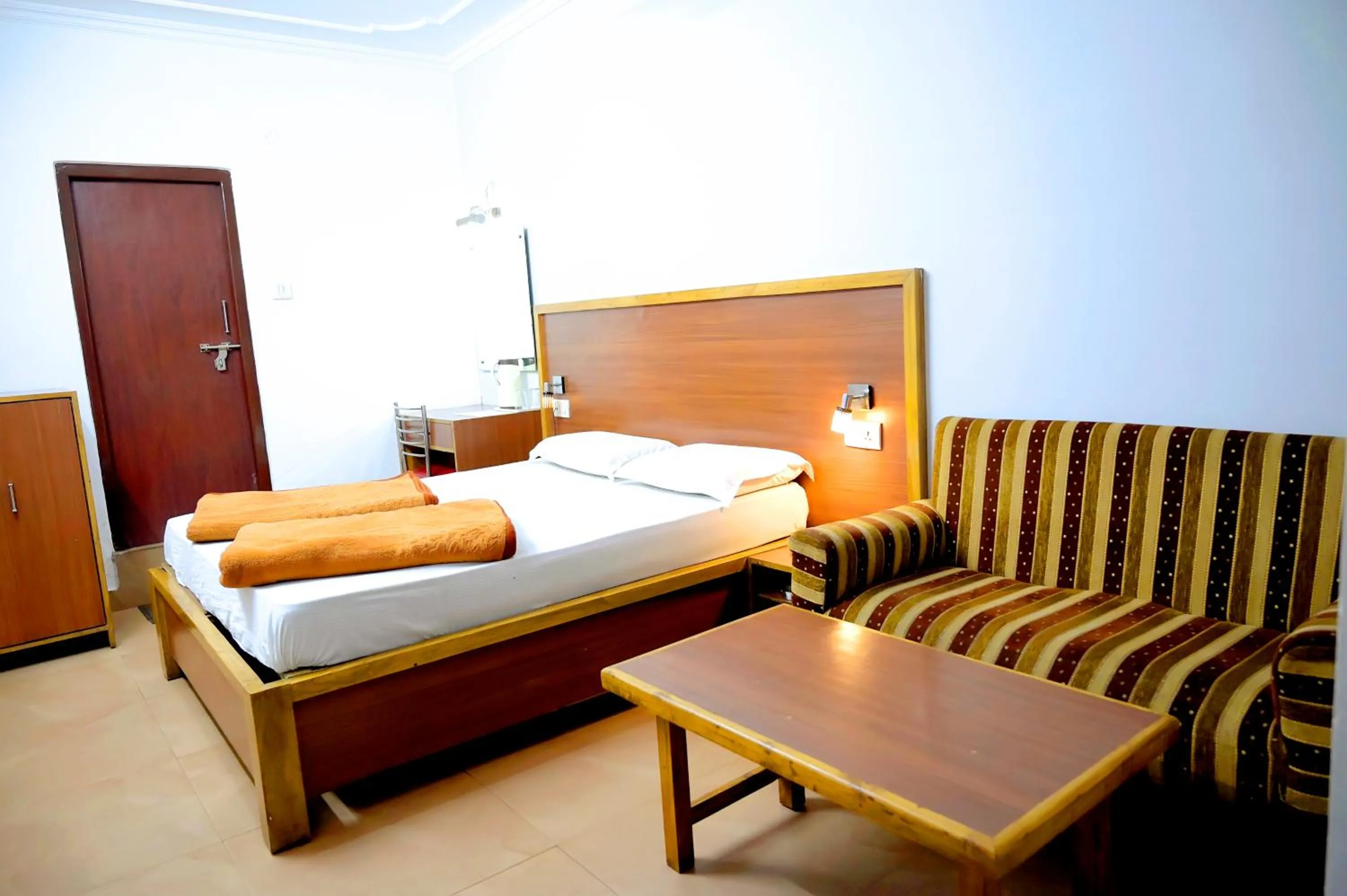 Bed in Subhash Hotel