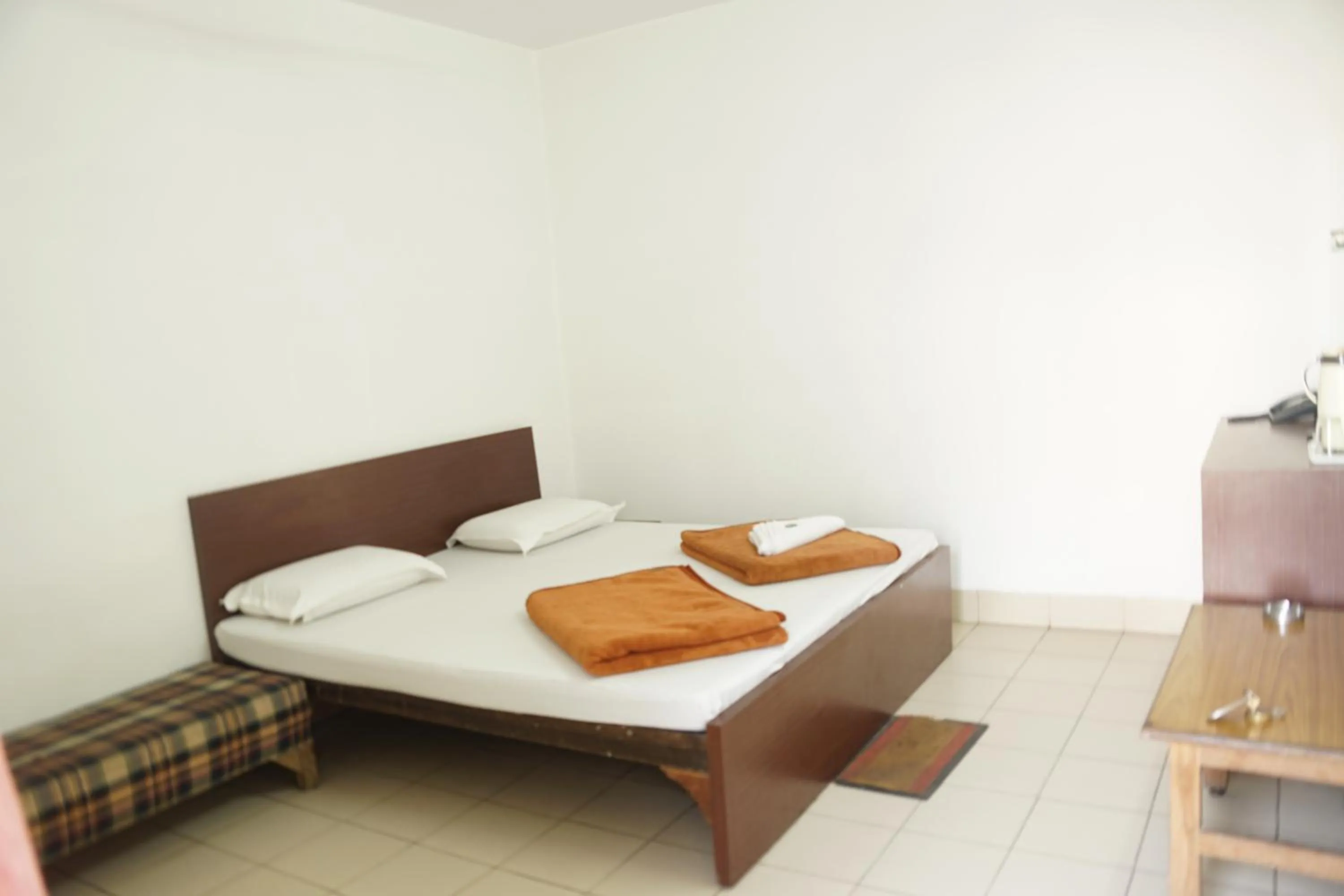 Bed in Subhash Hotel