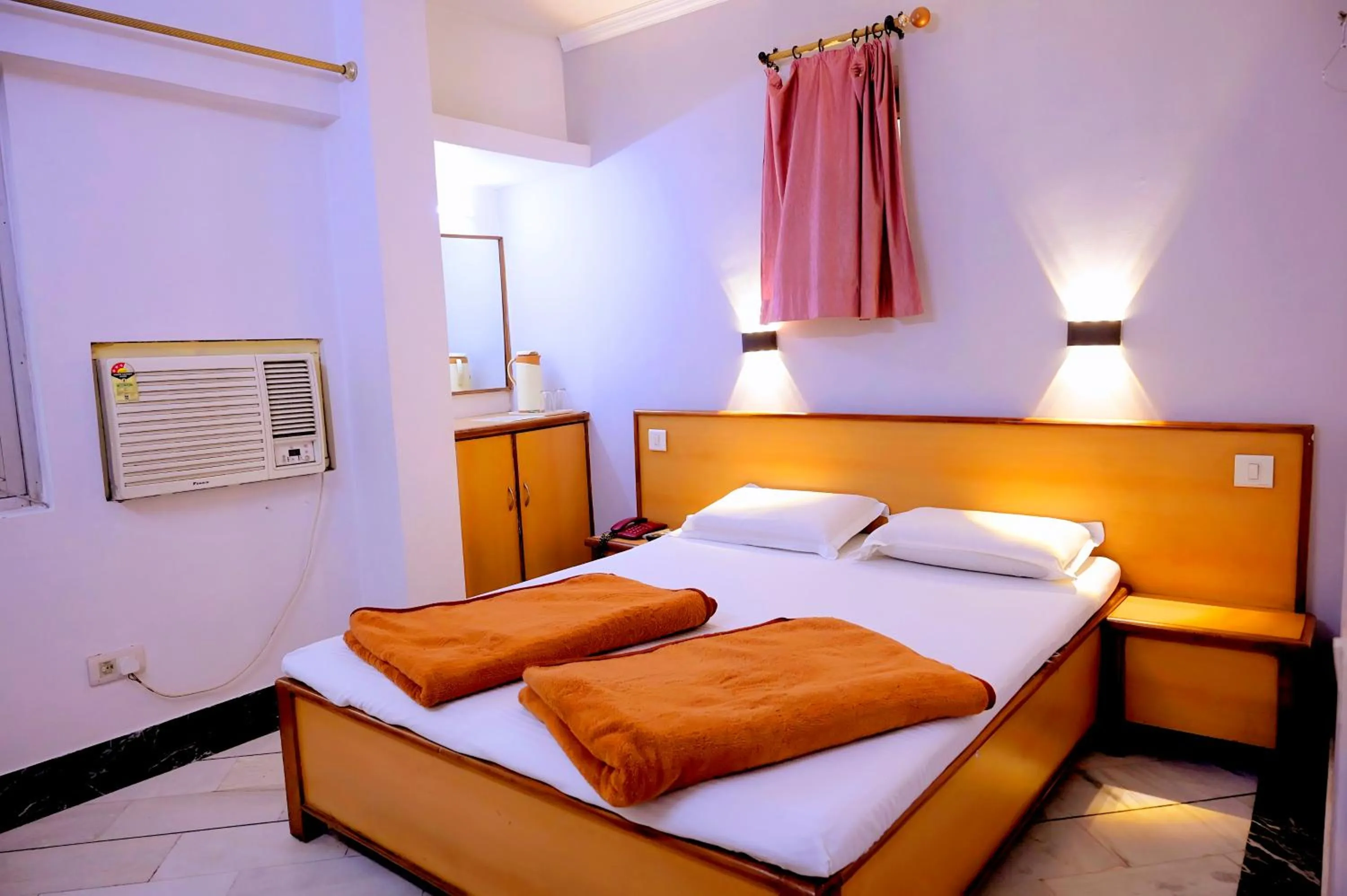 Bed in Subhash Hotel