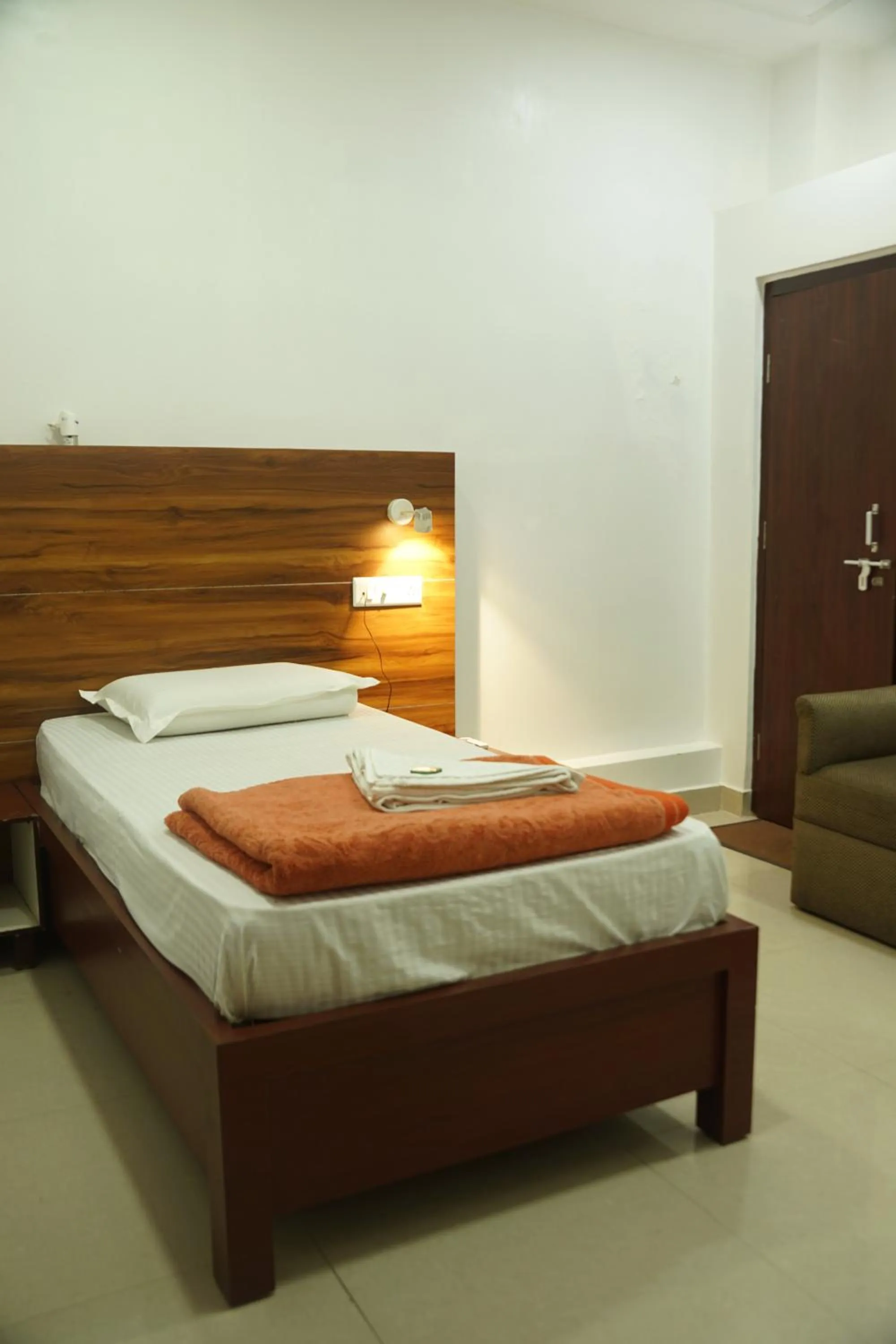 Bed in Subhash Hotel