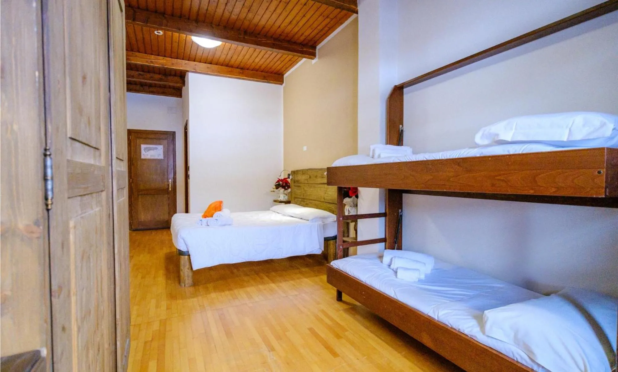 Bed in Chalet Le Alpi - Azzurro Club