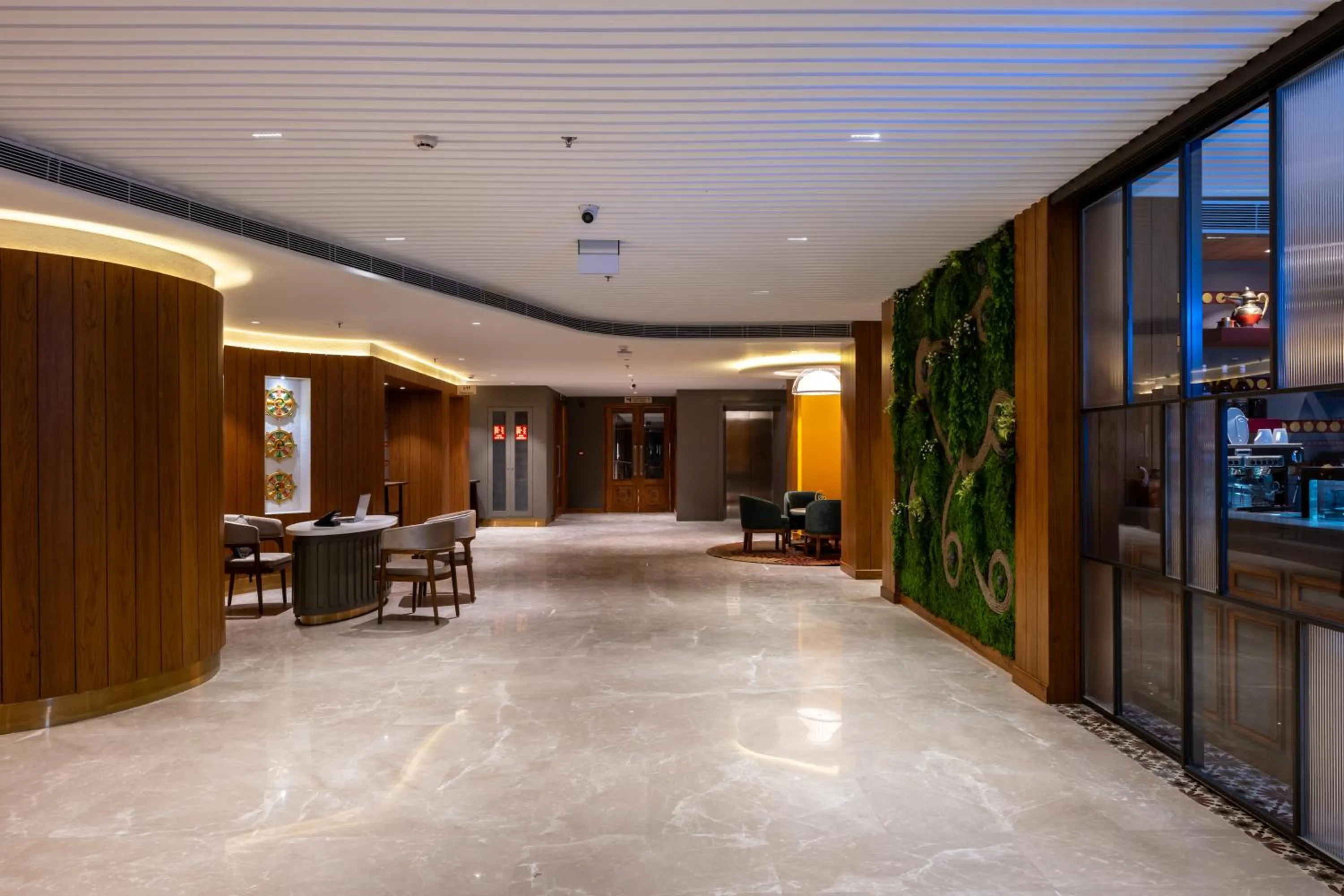 Lobby or reception in Charmwood Hotel
