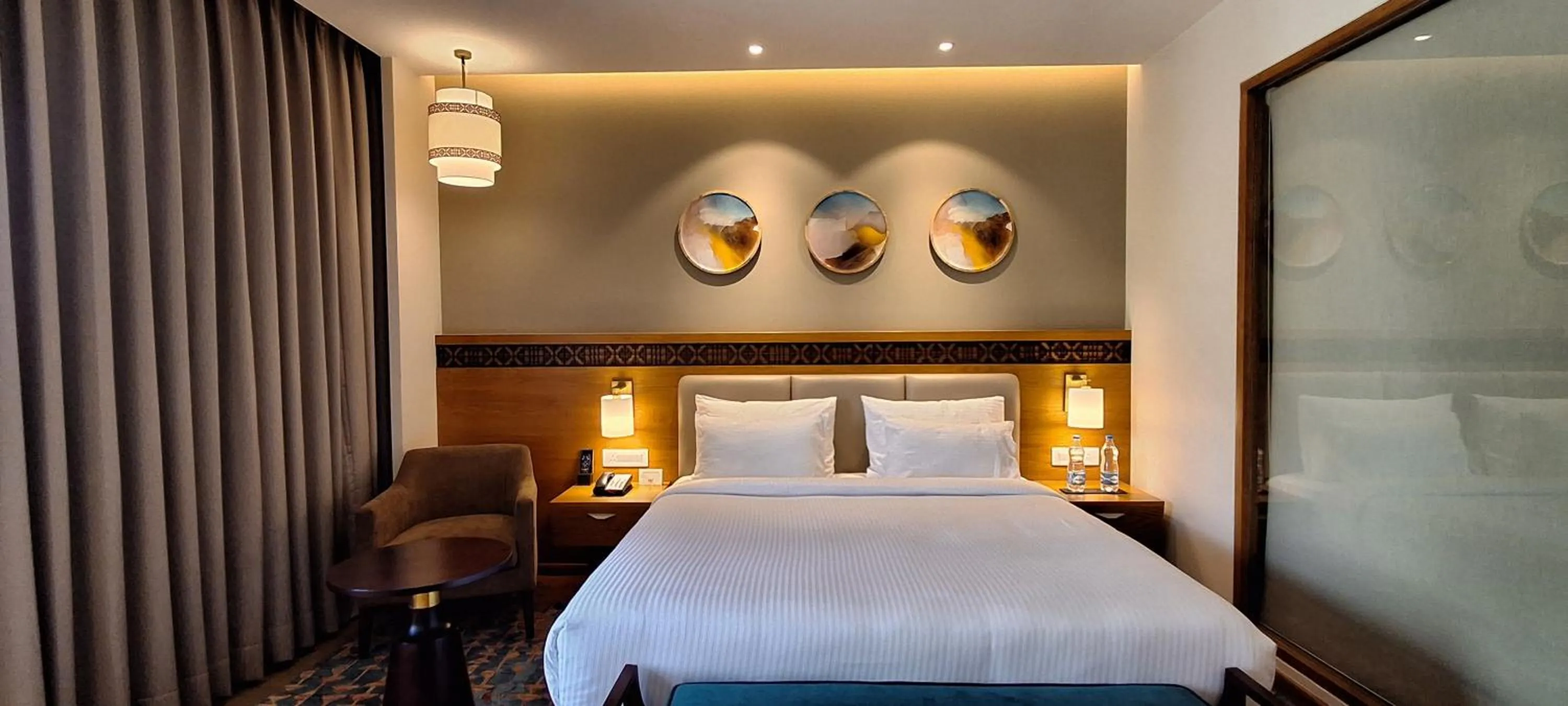 Bed in Charmwood Hotel