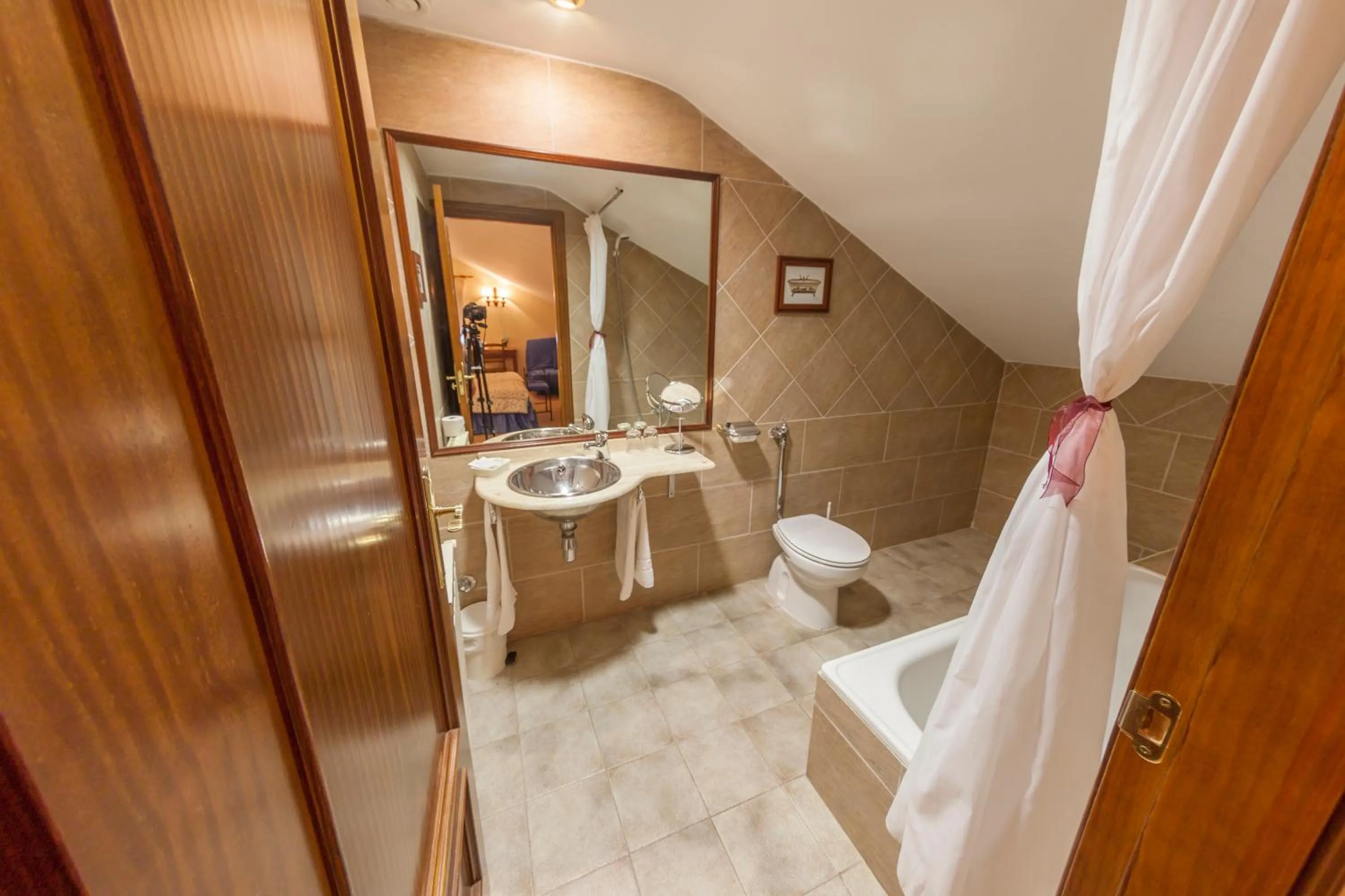 Bathroom in Hotel Mayno