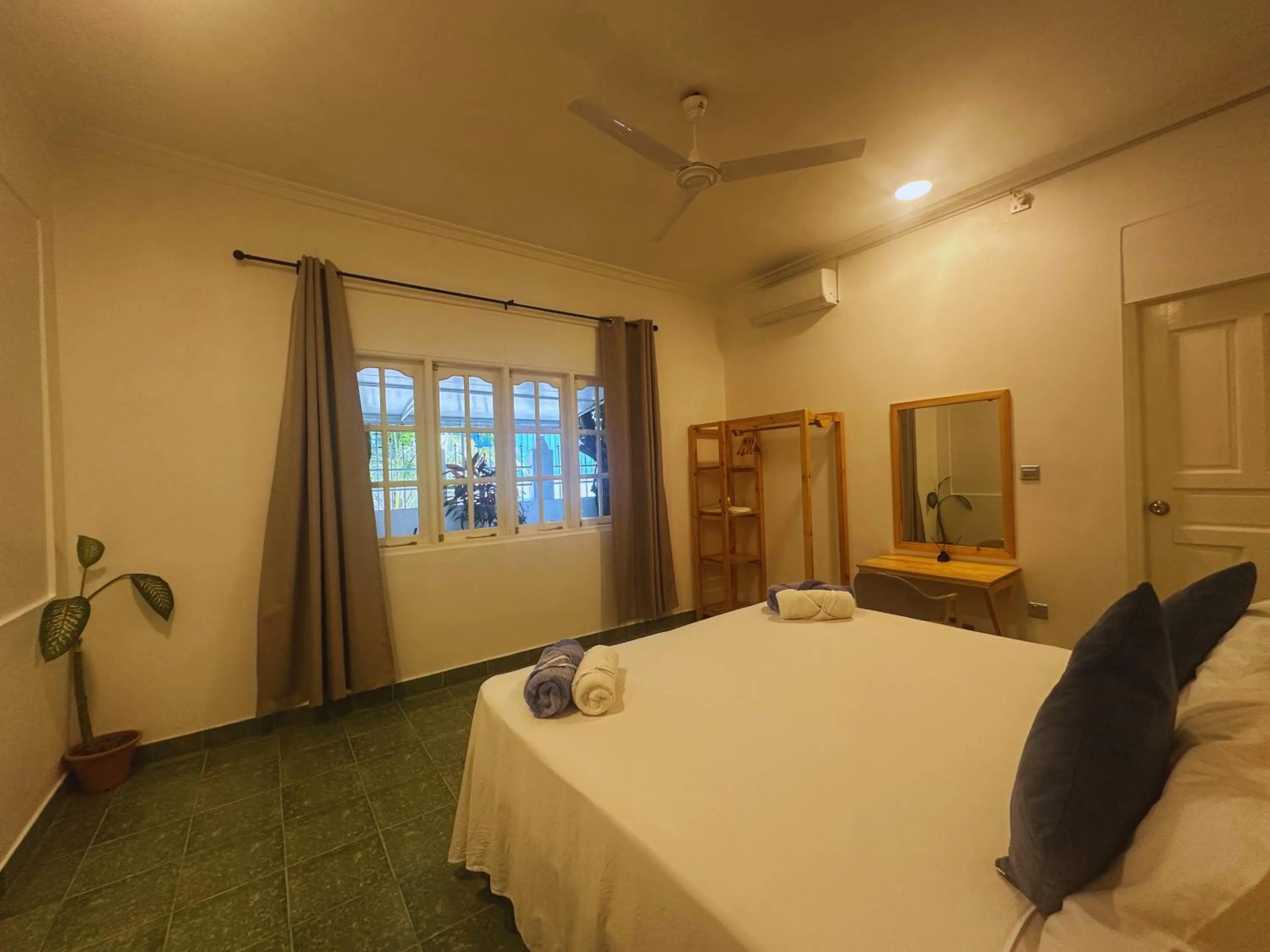 Bed in Bahaaru Villa Surf and Stay