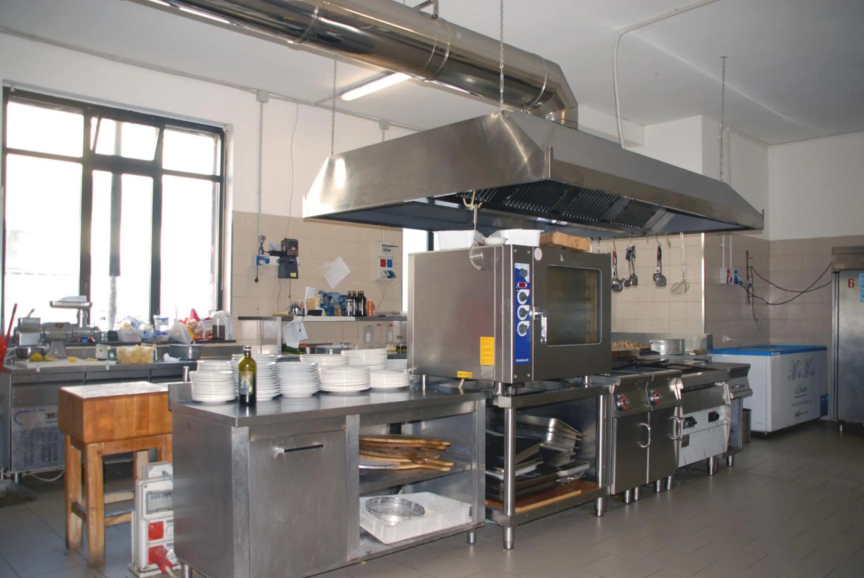 Communal kitchen in Hotel Ristorante Il Calipso by Mago