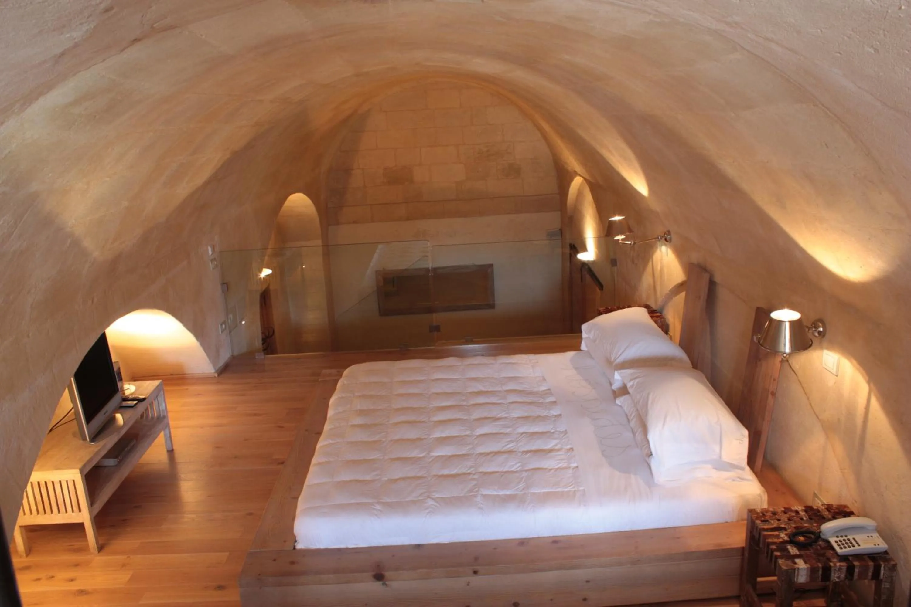 Bed in L'Hotel In Pietra