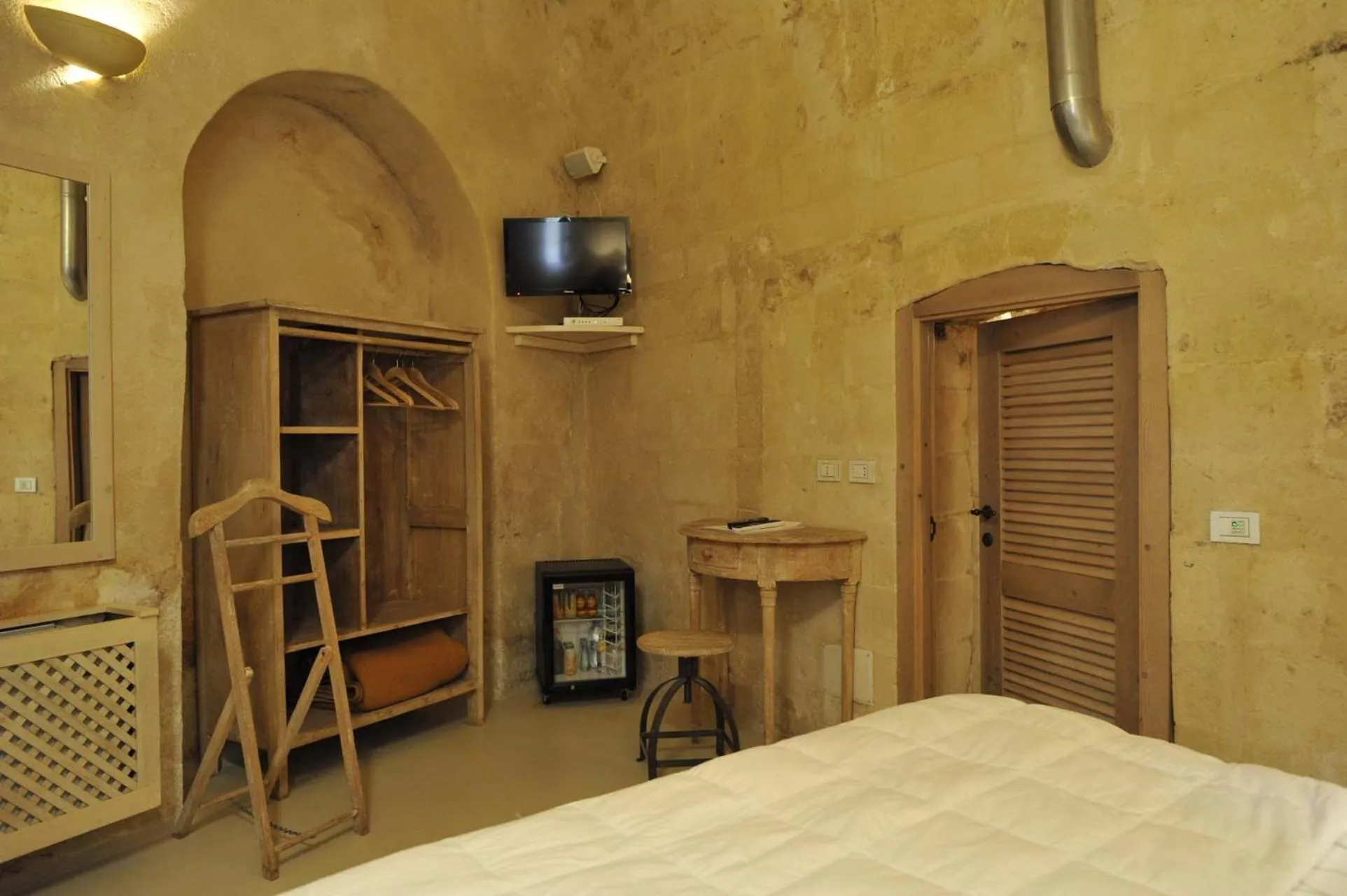 Bed in L'Hotel In Pietra