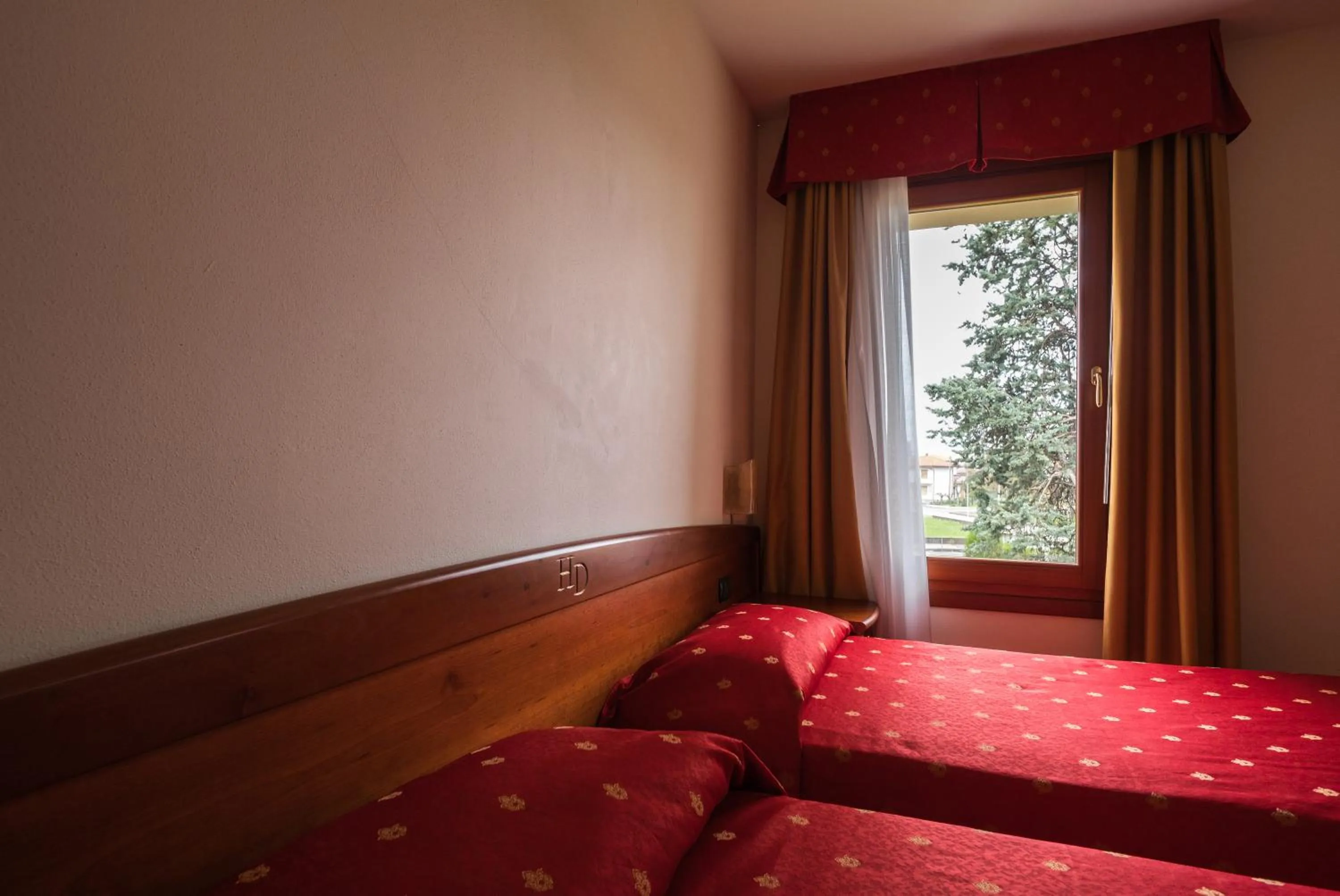 Bed in Hotel Dall'Ongaro