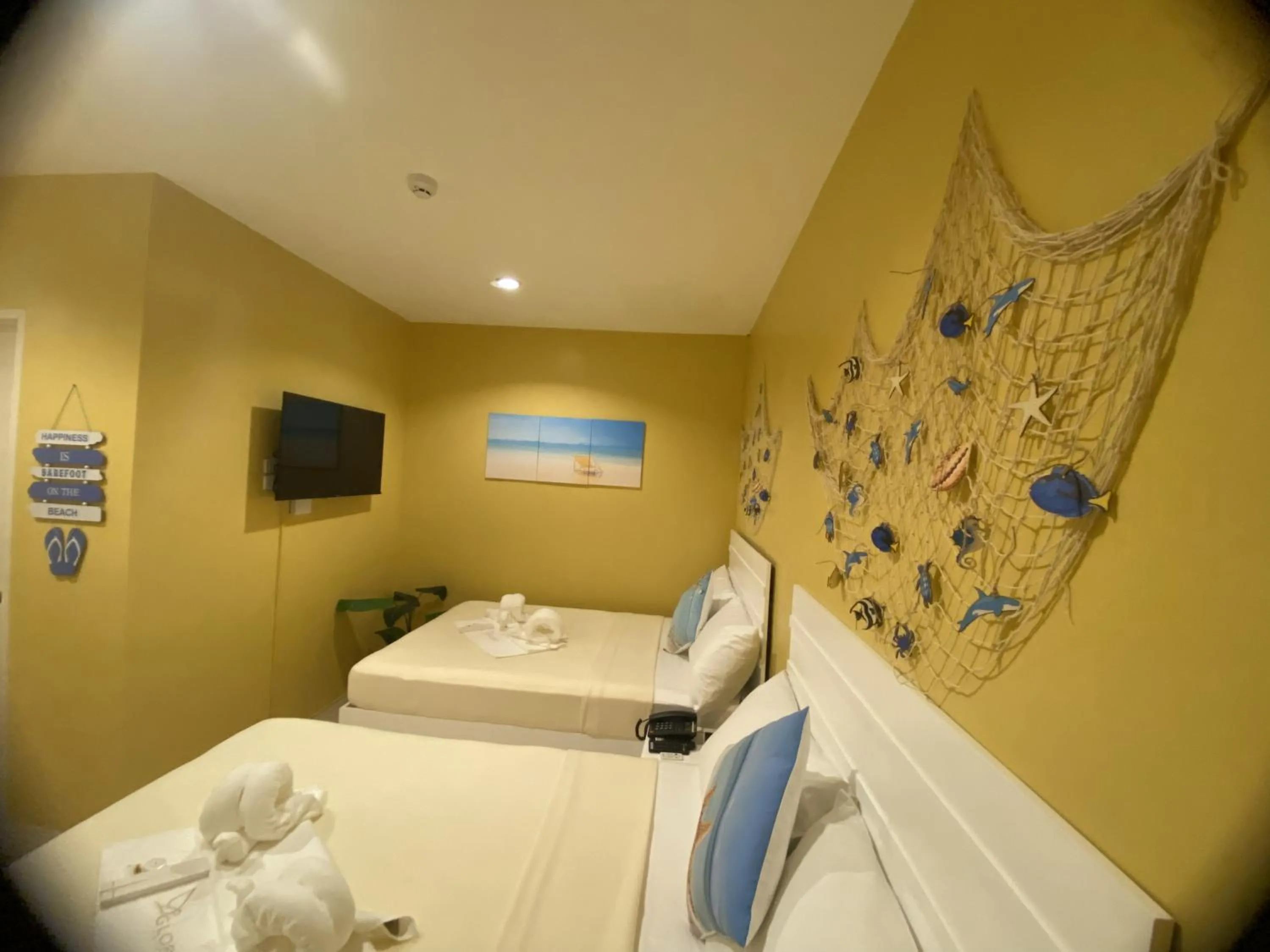 Bed in Glory Inn and Suites Boracay