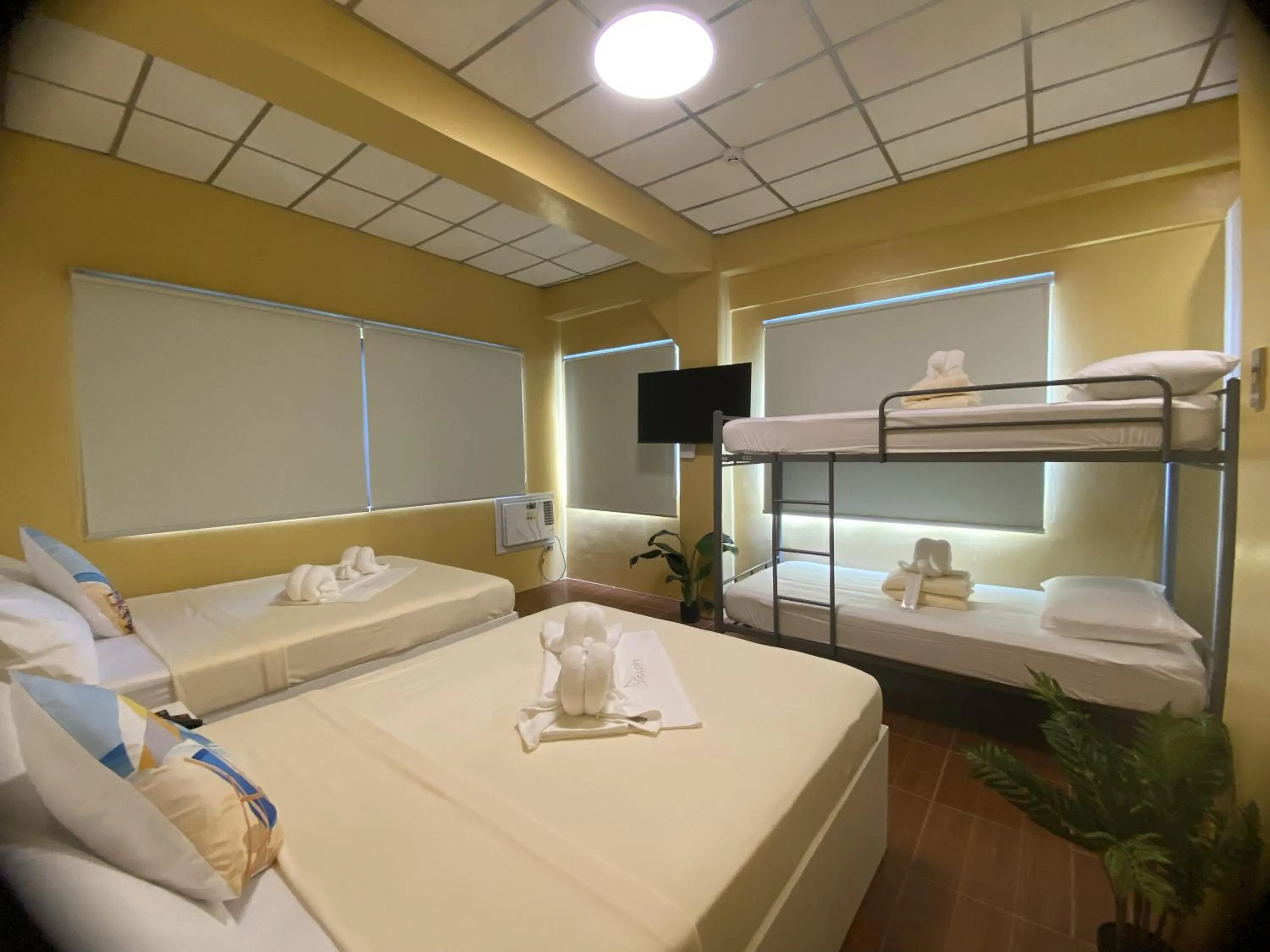Bed in Glory Inn and Suites Boracay