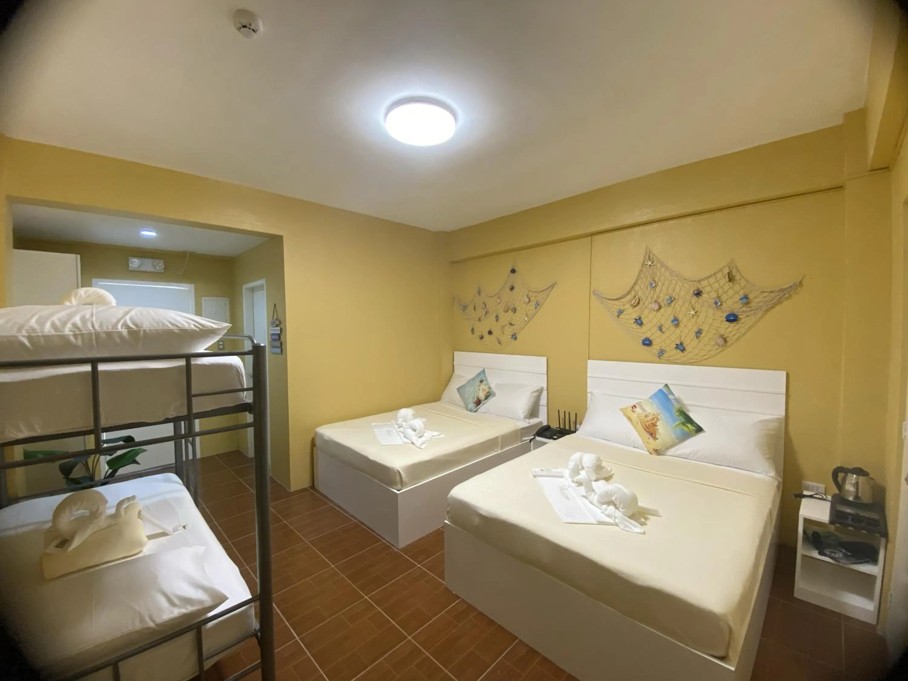 Bed in Glory Inn and Suites Boracay