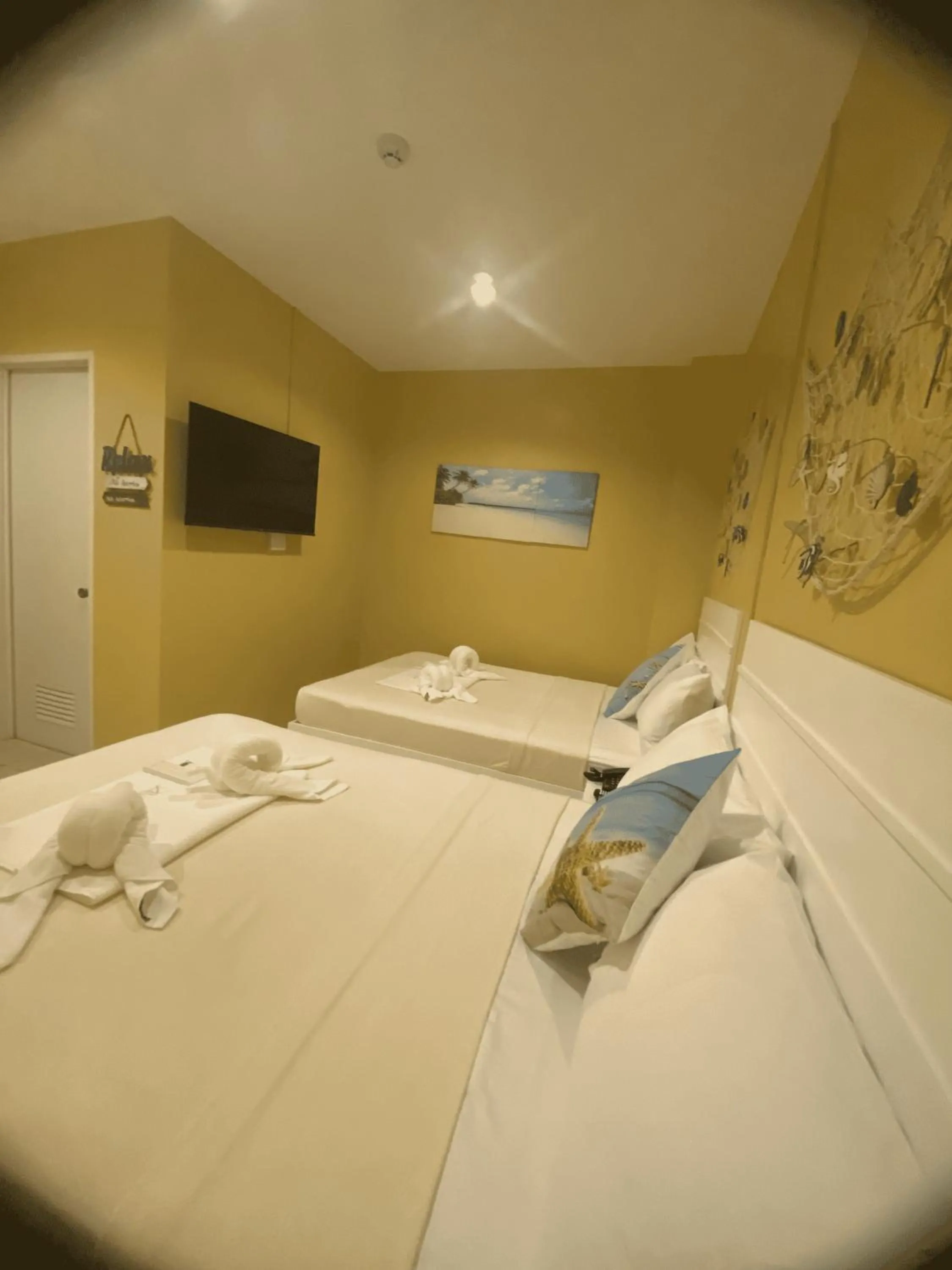 Bed in Glory Inn and Suites Boracay