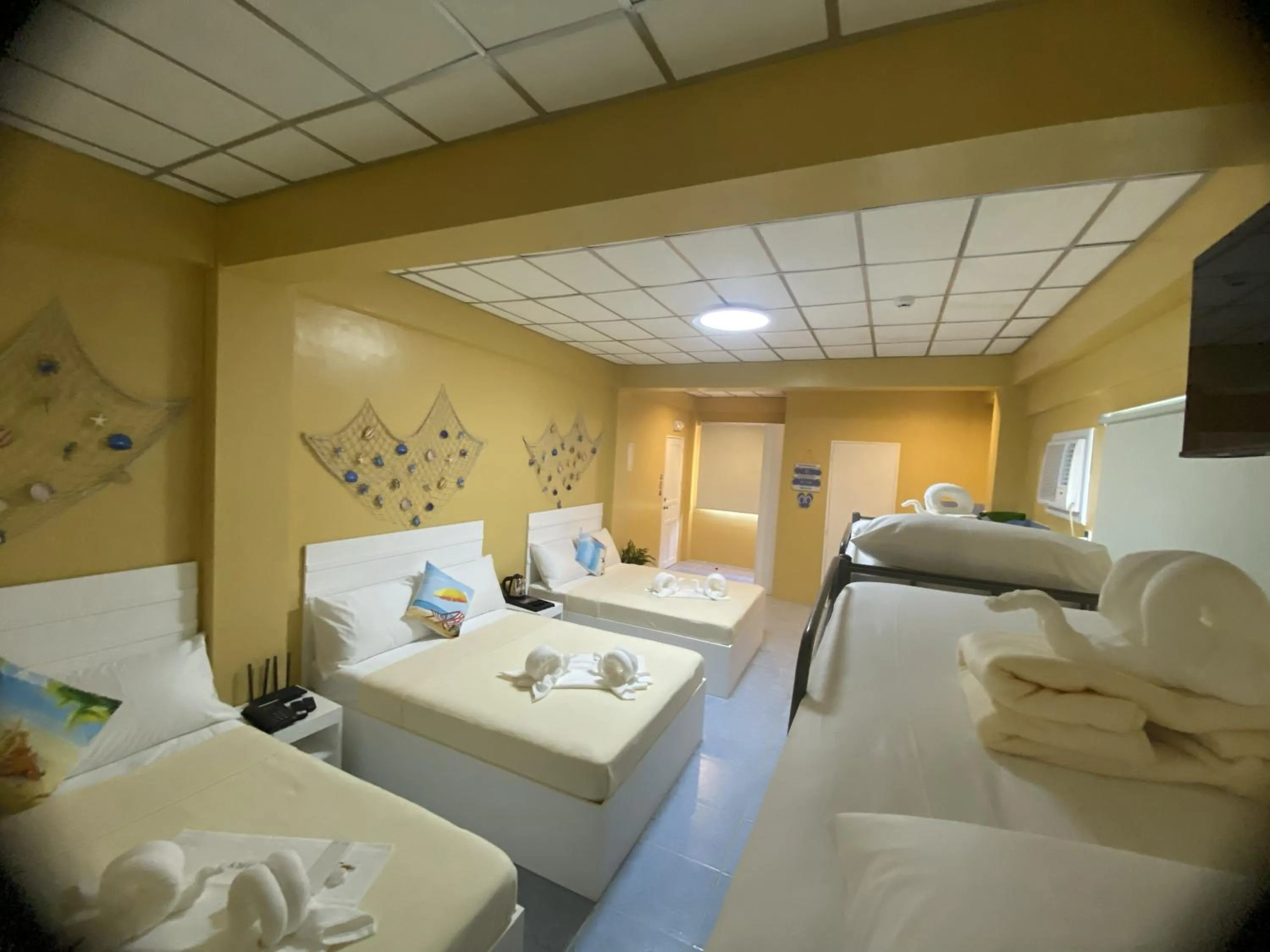 Bed in Glory Inn and Suites Boracay