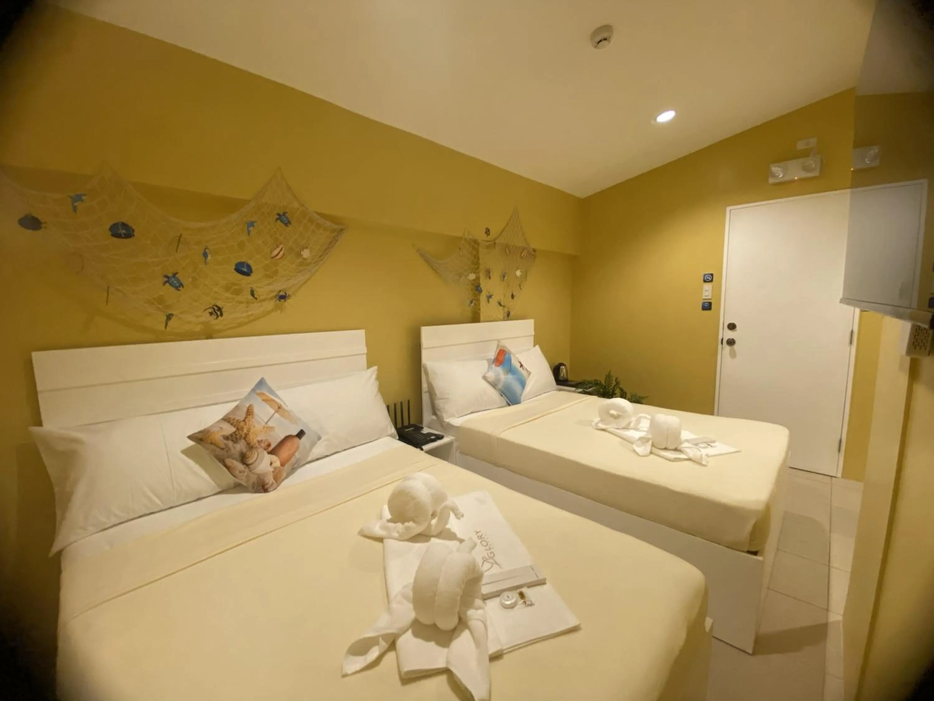 Bed in Glory Inn and Suites Boracay
