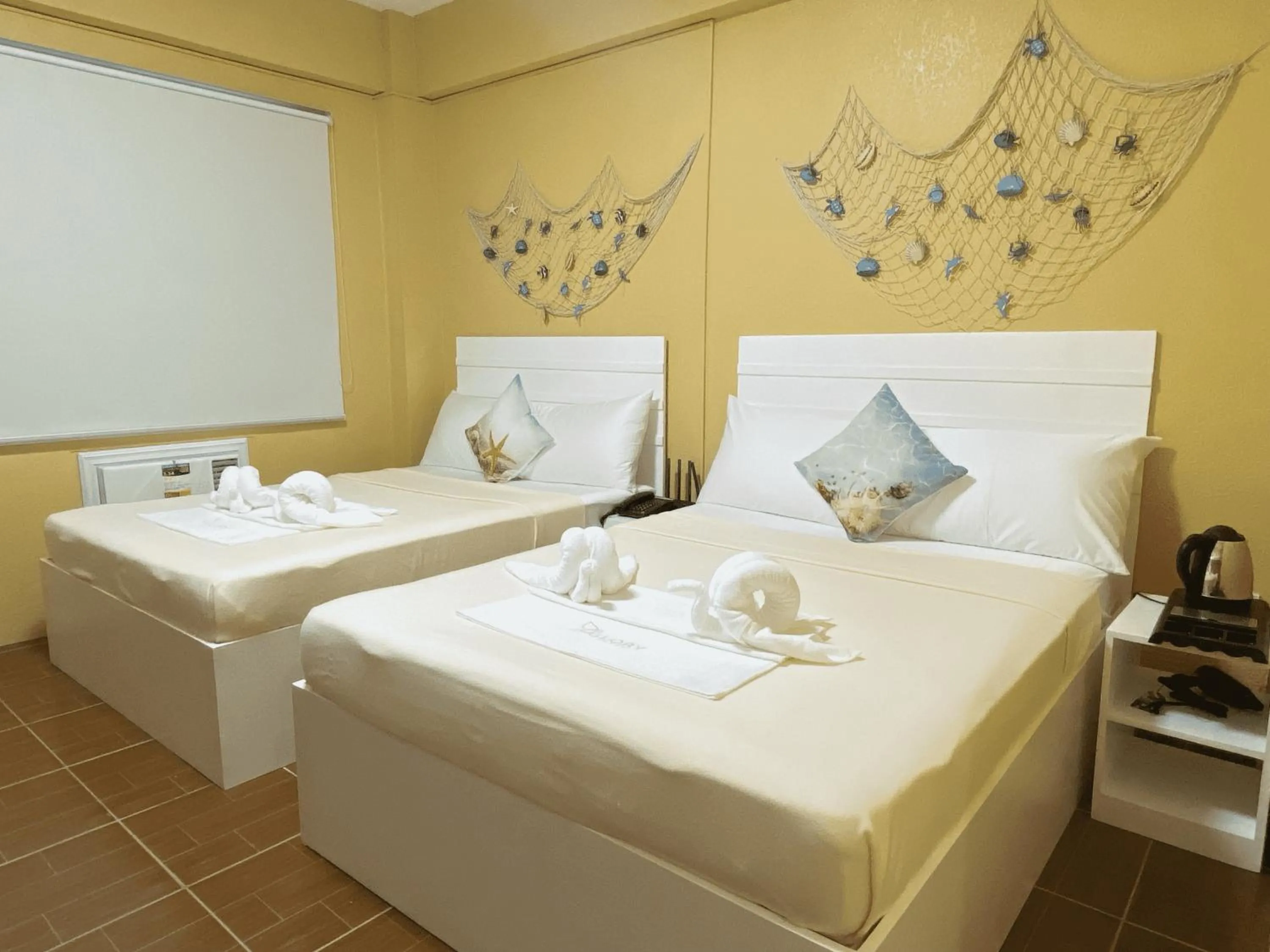 Bed in Glory Inn and Suites Boracay