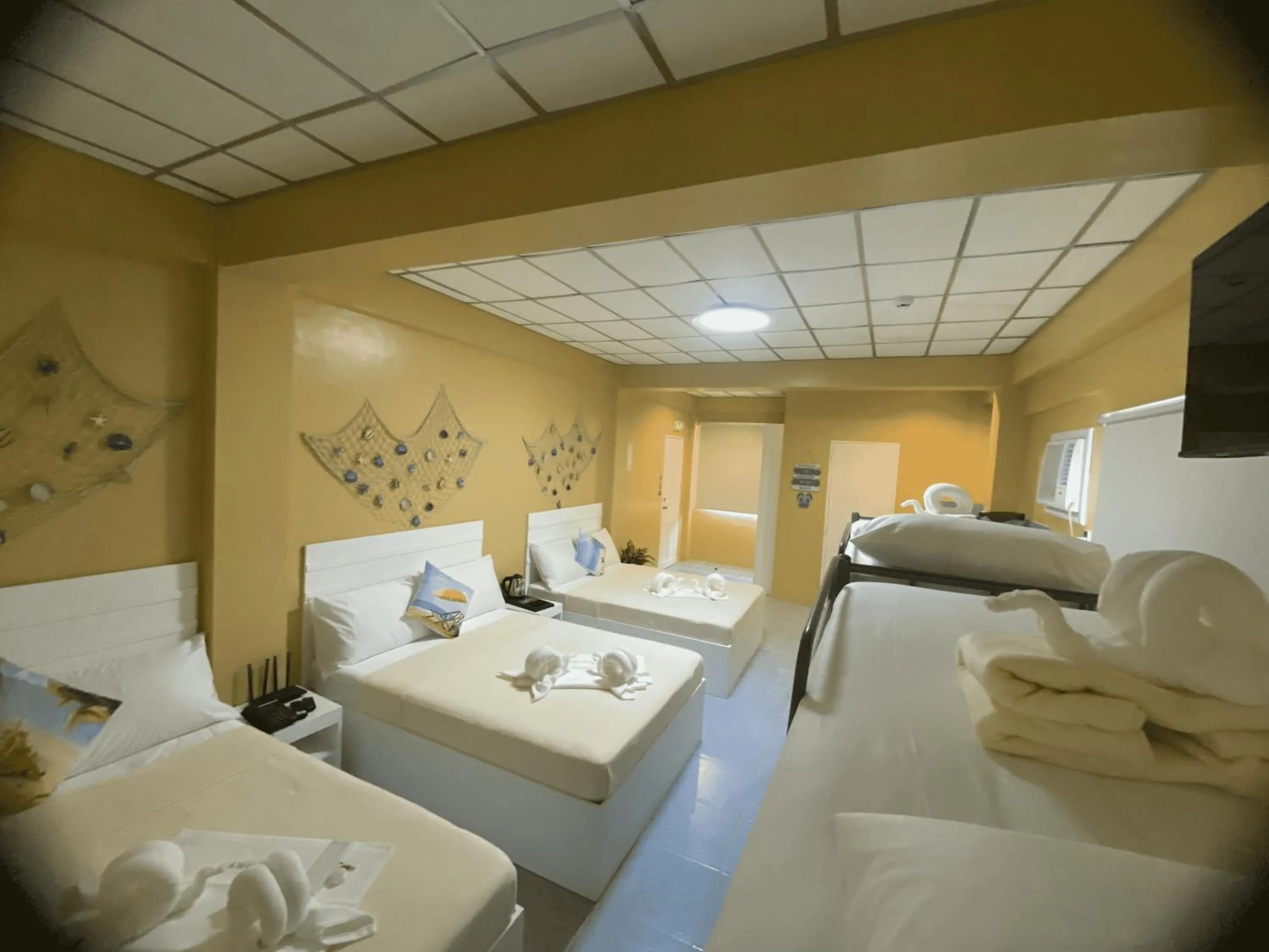 Bed in Glory Inn and Suites Boracay