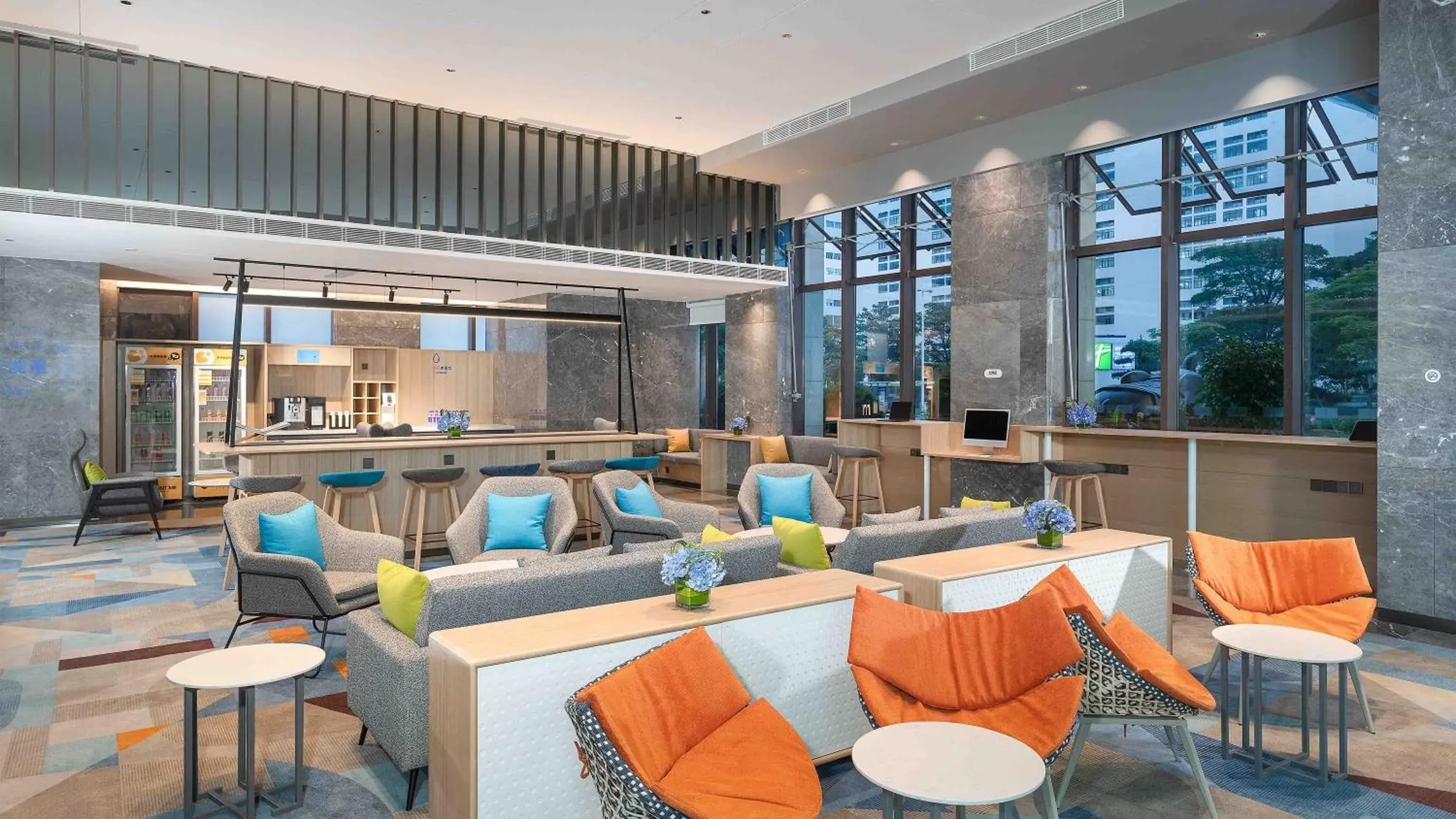 Lobby or reception in Holiday Inn Express Foshan Shunde Lecong by IHG Lobby or reception in Holiday Inn Express Foshan Shunde Lecong by IHG