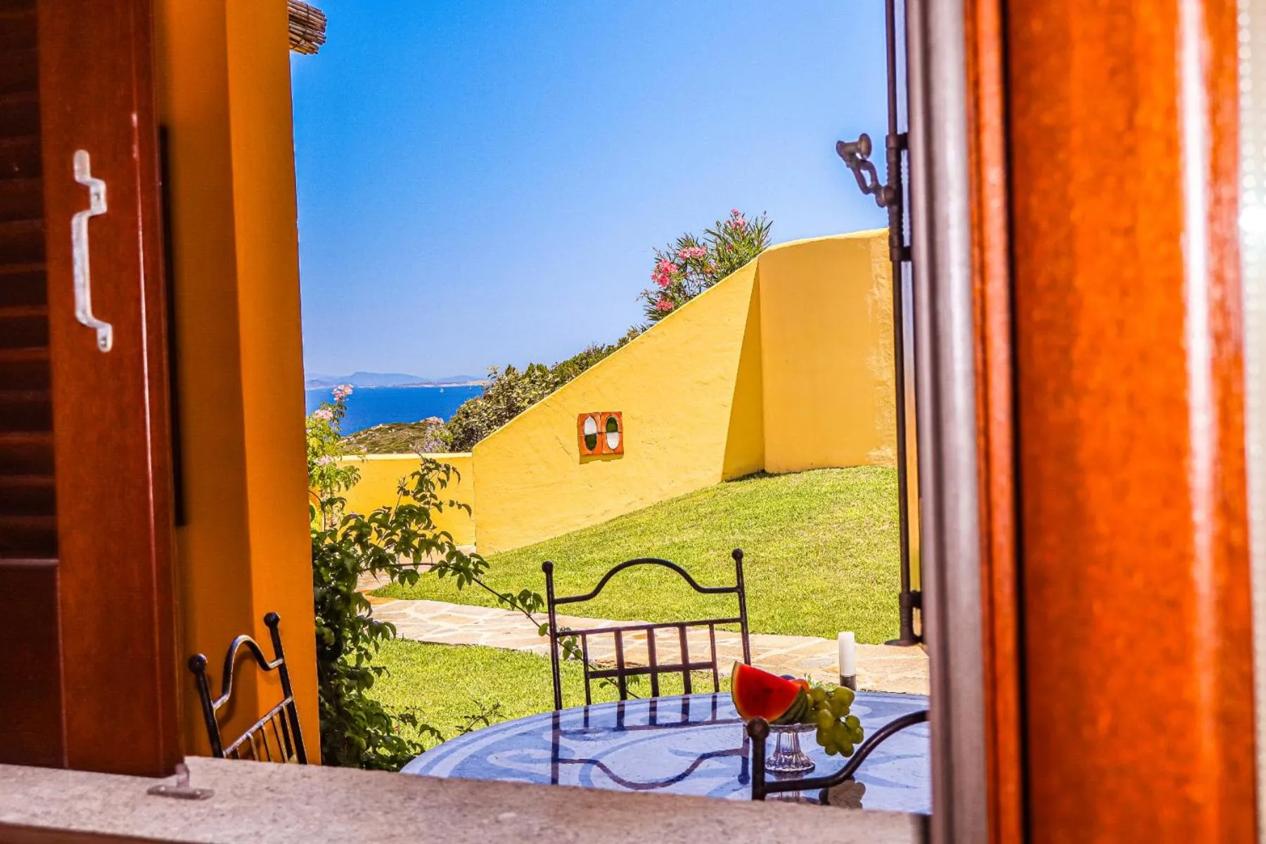 Patio in Borgo Arborea Charming Retreat