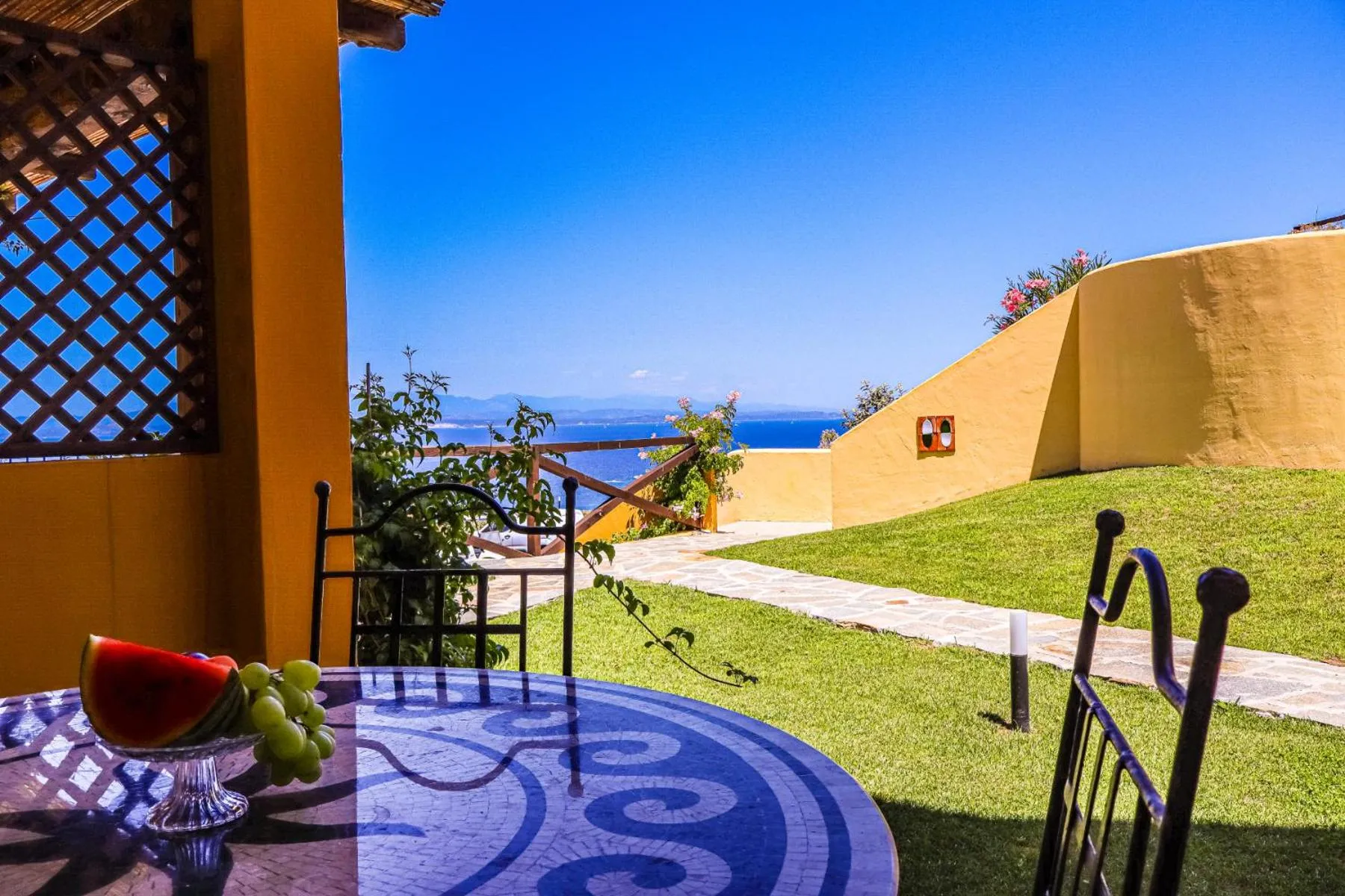 Patio in Borgo Arborea Charming Retreat