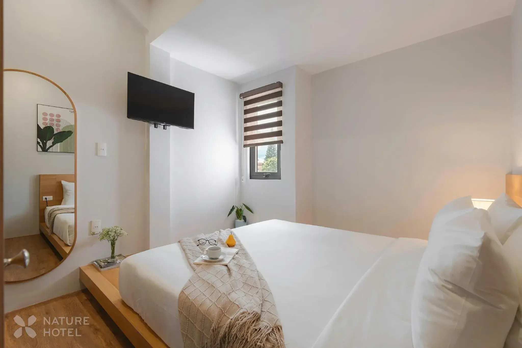 Communal lounge/ TV room, Bed in Nature Hotel - Le Hong Phong Communal lounge/ TV room, Bed in Nature Hotel - Le Hong Phong