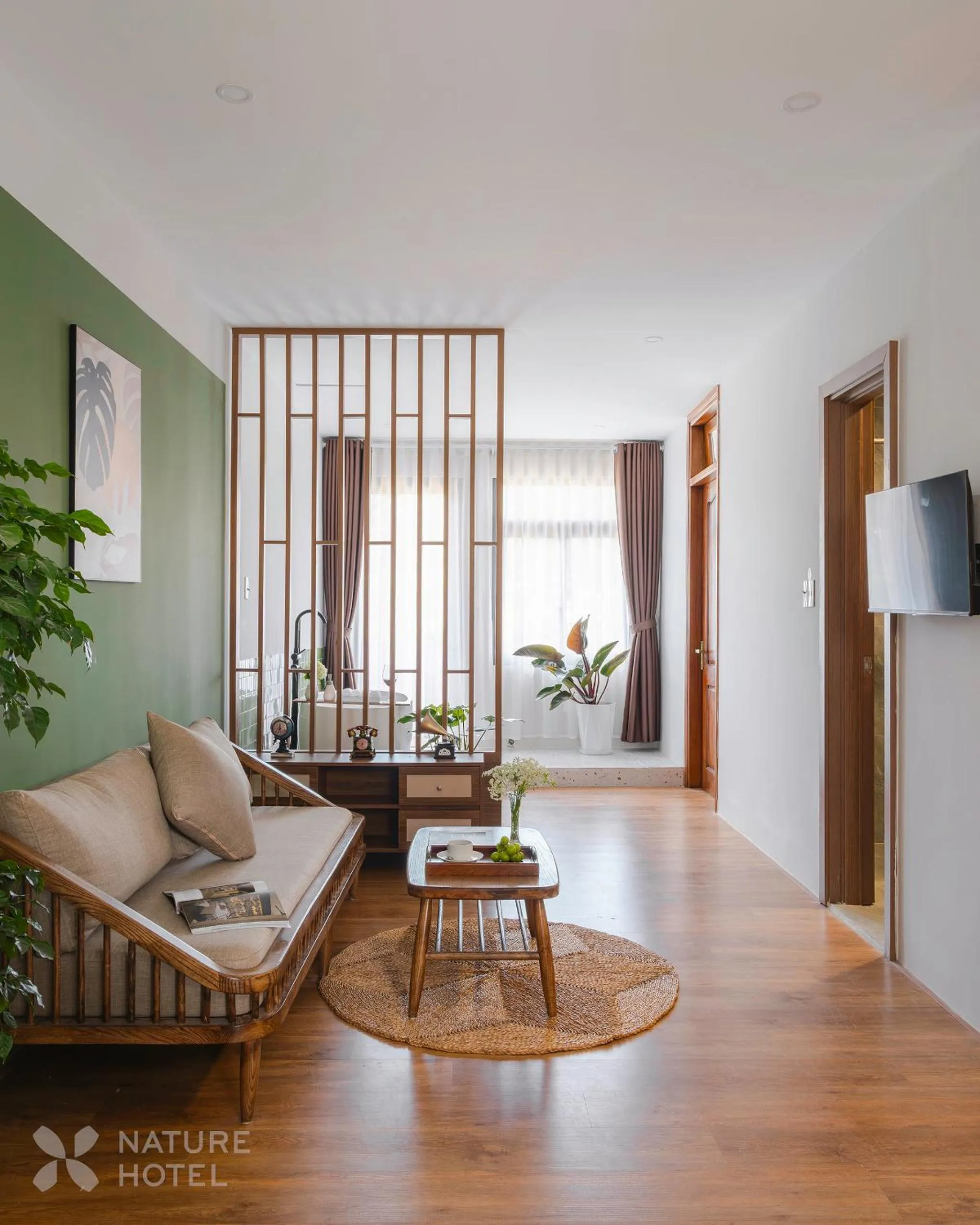 Communal lounge/ TV room in Nature Hotel - Le Hong Phong