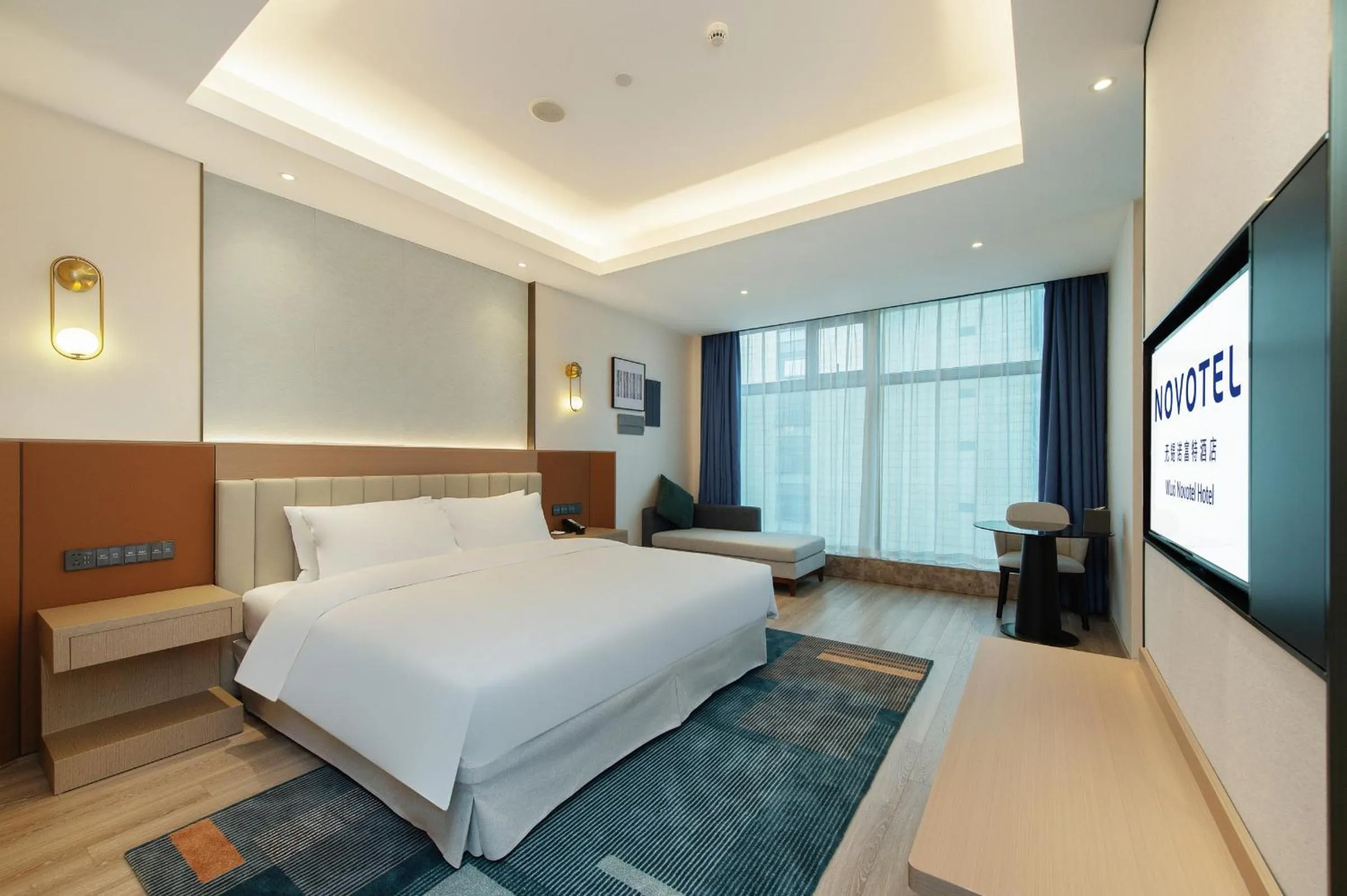Photo of the whole room, Bed in Novotel Wuxi