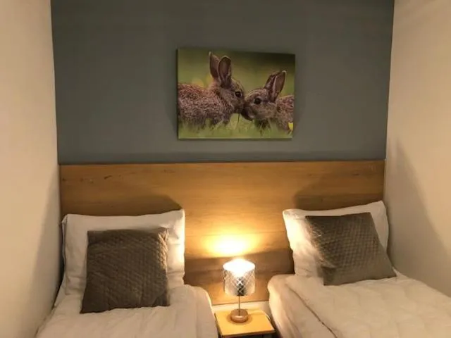 Property building, Bed in Apartments Four Seasons Zuiderstraat