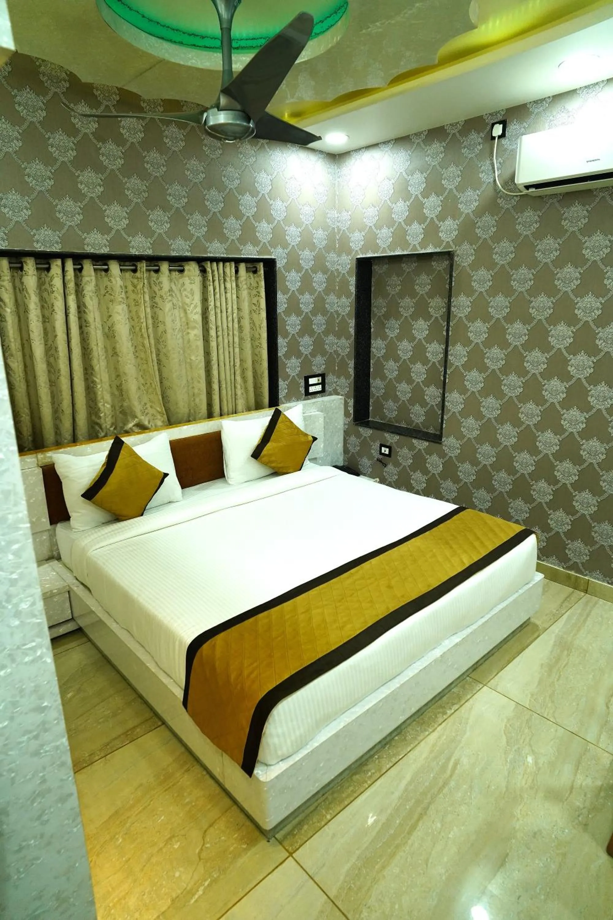 Bed in THE MANTRA- A Luxury Boutique Hotel
