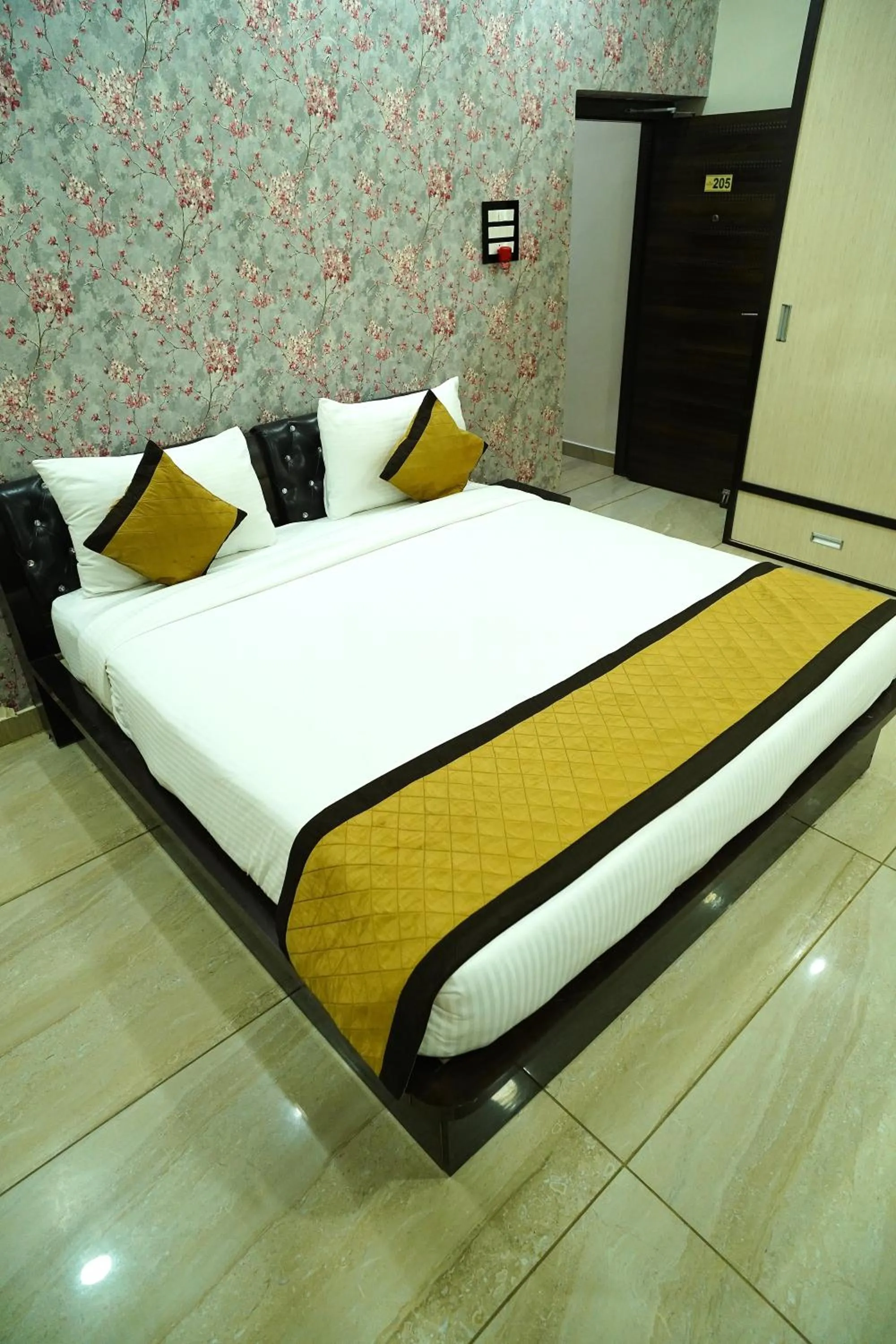 Bed in THE MANTRA- A Luxury Boutique Hotel