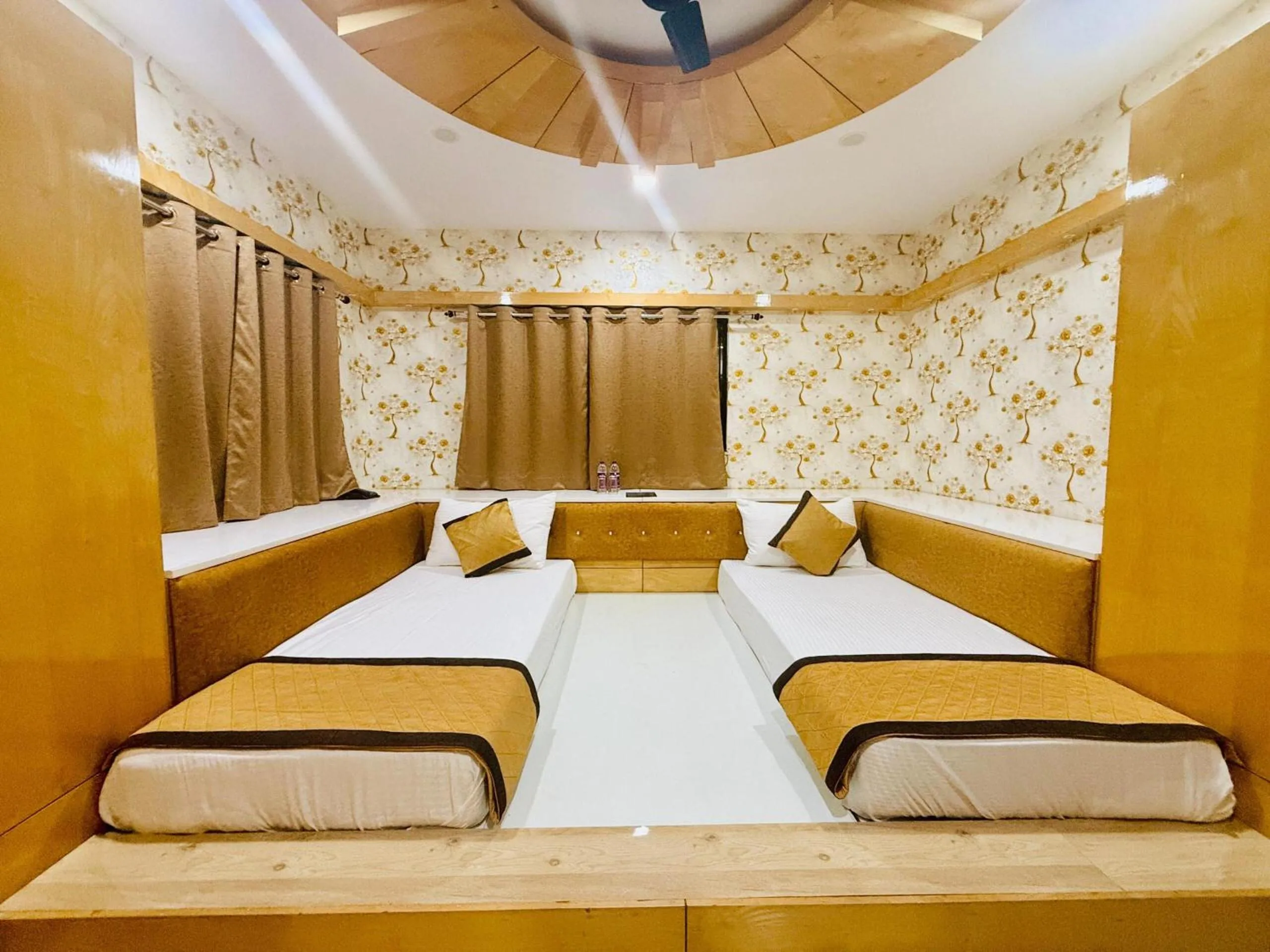 Bed in THE MANTRA- A Luxury Boutique Hotel