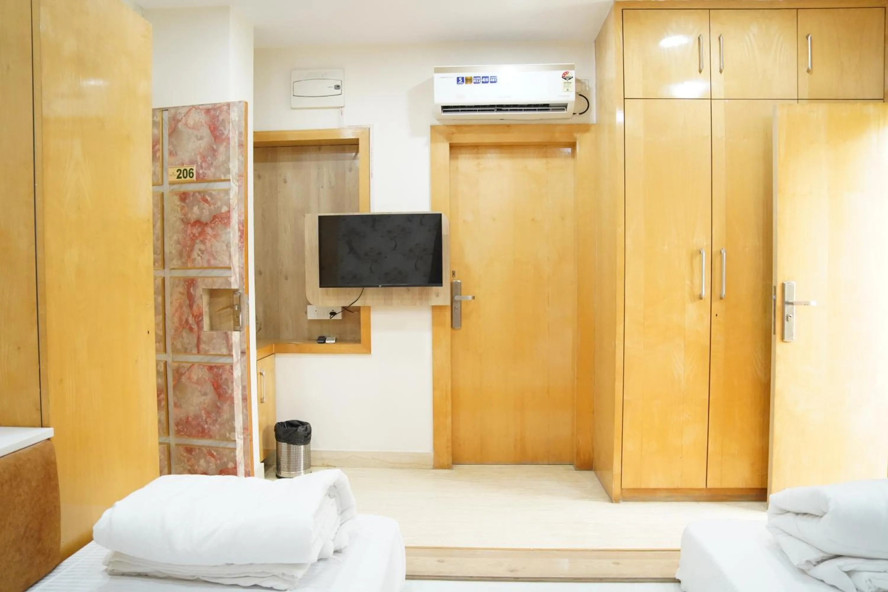 Bed in THE MANTRA- A Luxury Boutique Hotel