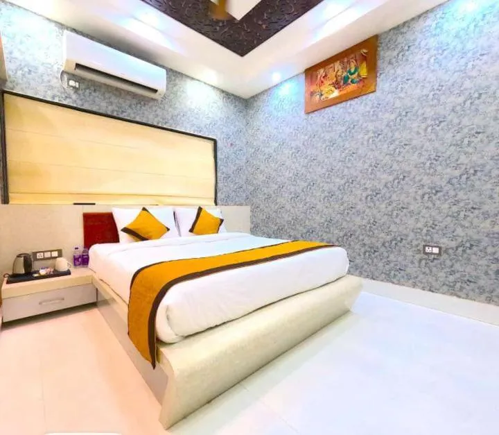 Bed in THE MANTRA- A Luxury Boutique Hotel