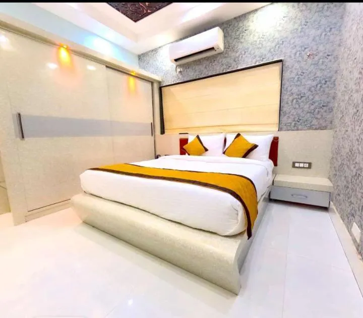 Bed in THE MANTRA- A Luxury Boutique Hotel