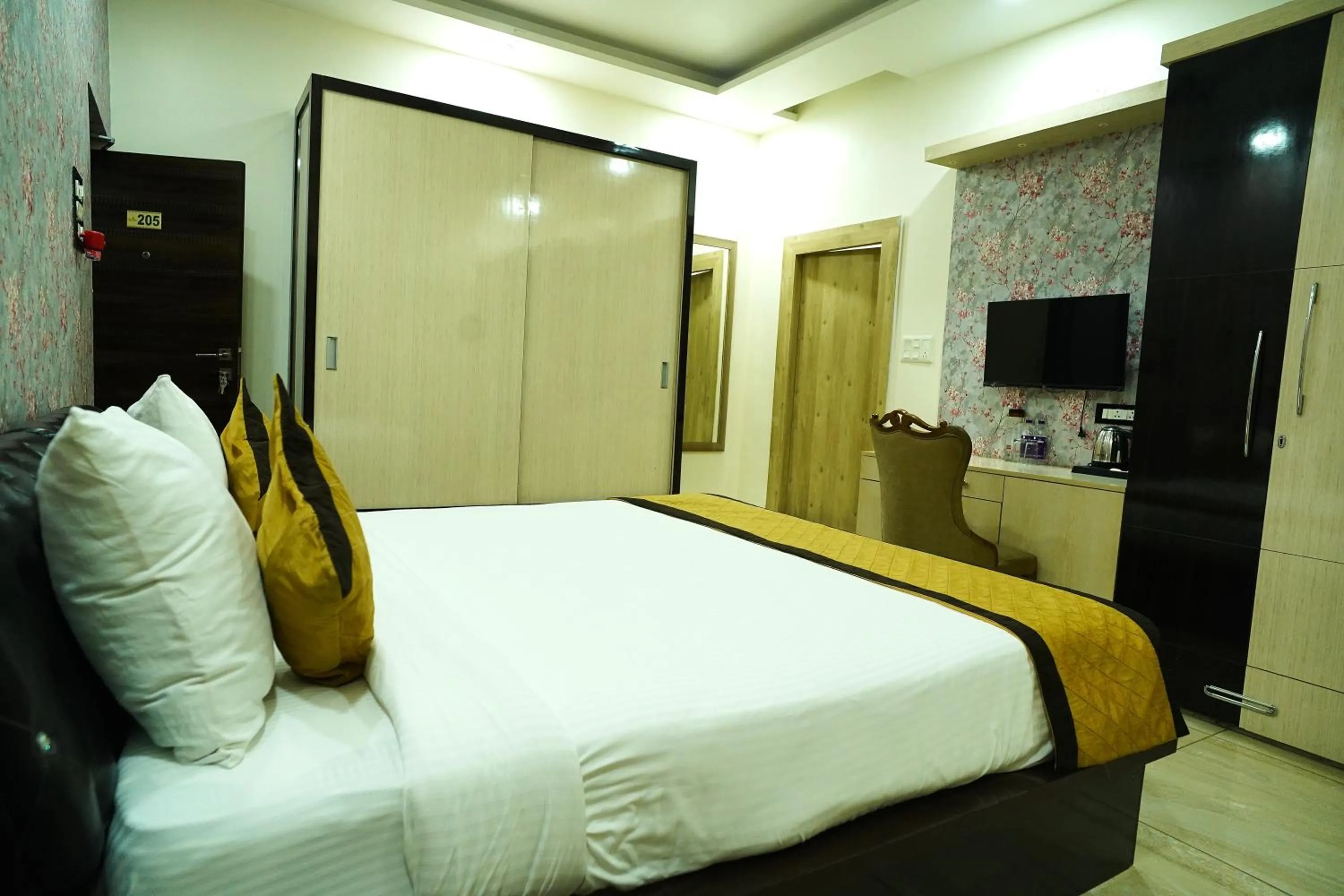 Bed in THE MANTRA- A Luxury Boutique Hotel