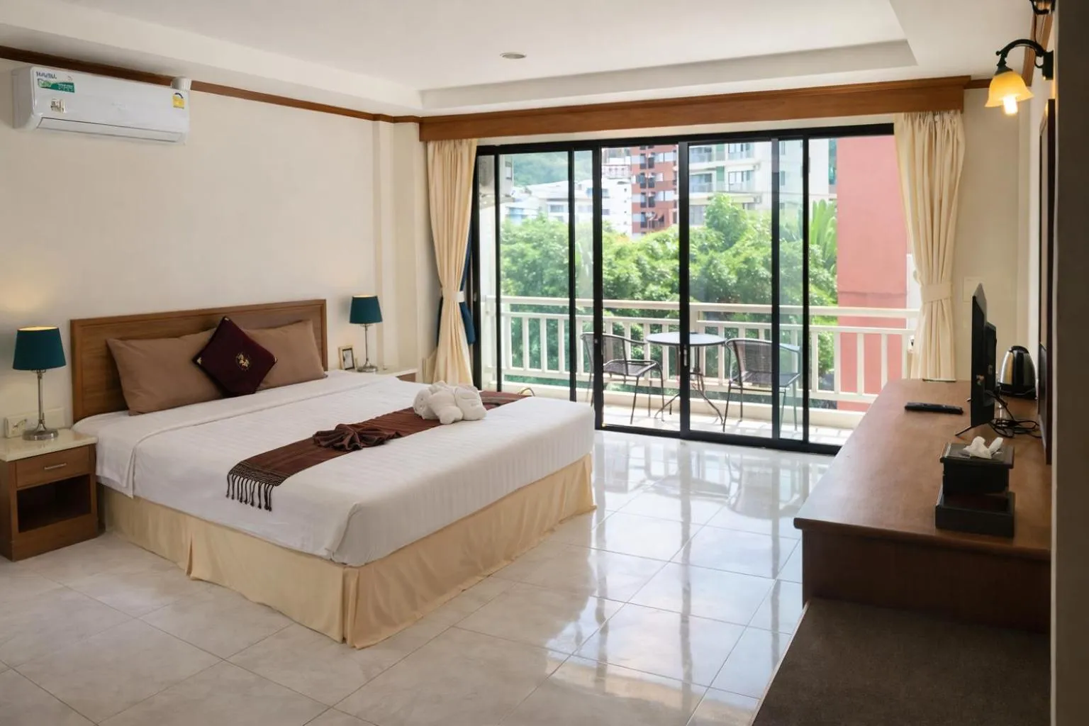 Bed in Global Hotel Beach View