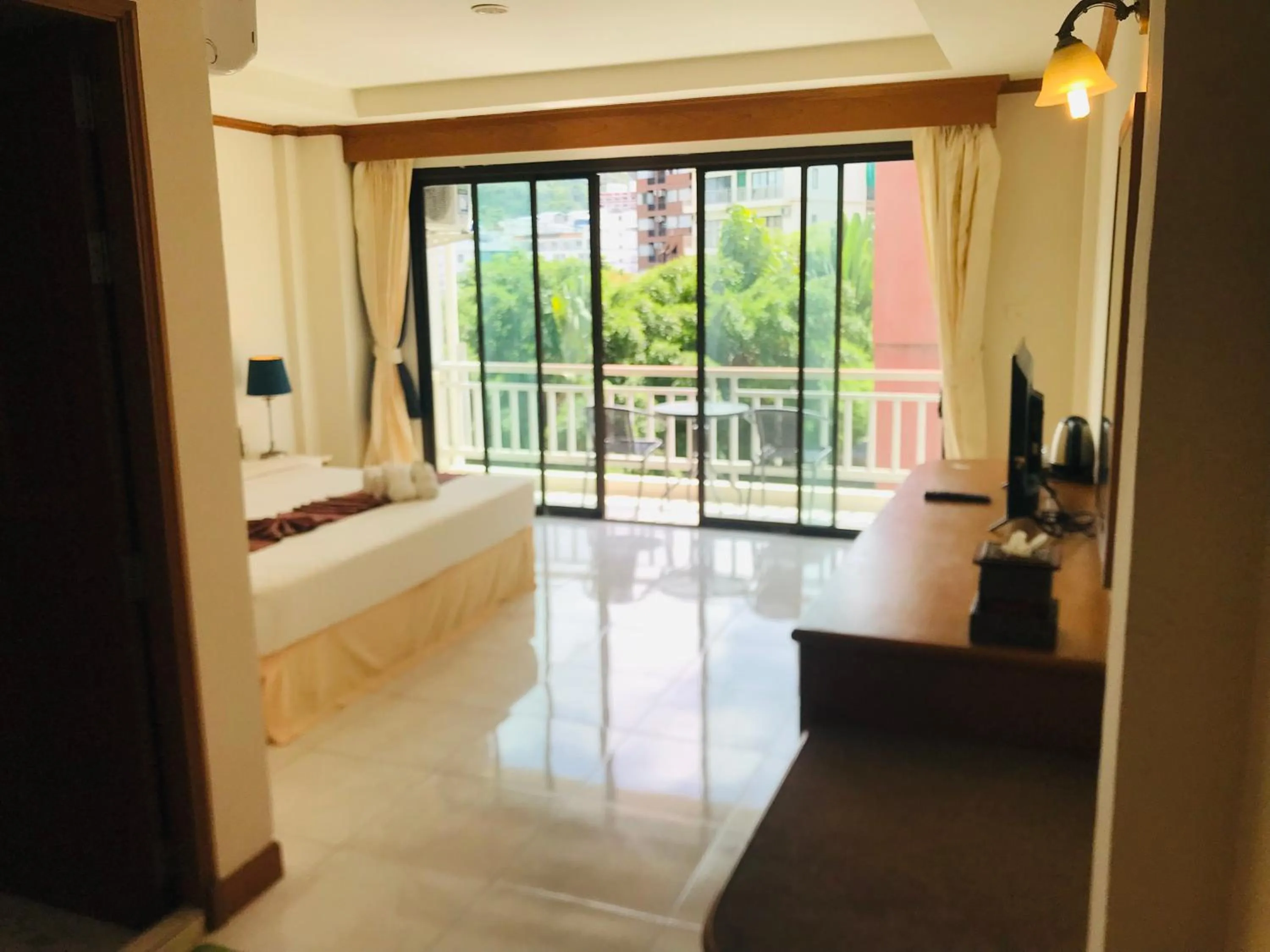 Bed in Global Hotel Beach View