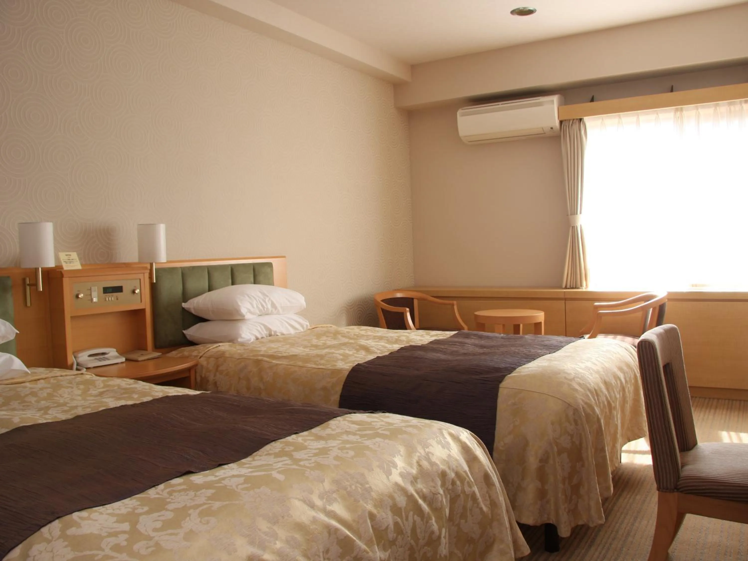 Photo of the whole room, Bed in Okazaki New Grand Hotel