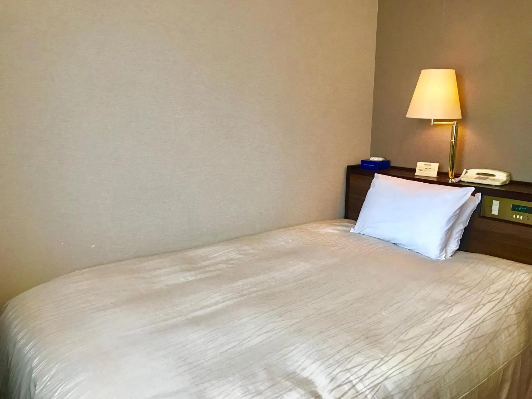 Bed in Okazaki New Grand Hotel