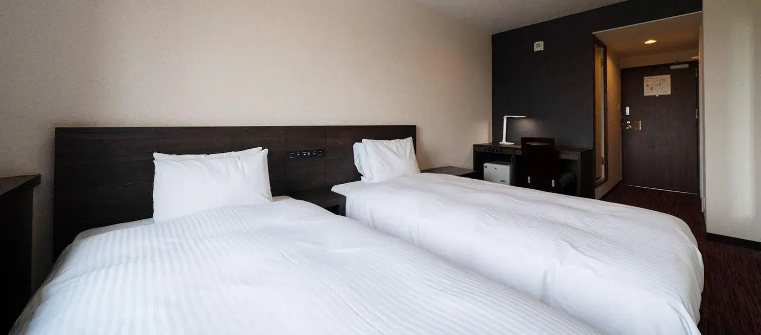 Bed in Okazaki New Grand Hotel Bed in Okazaki New Grand Hotel